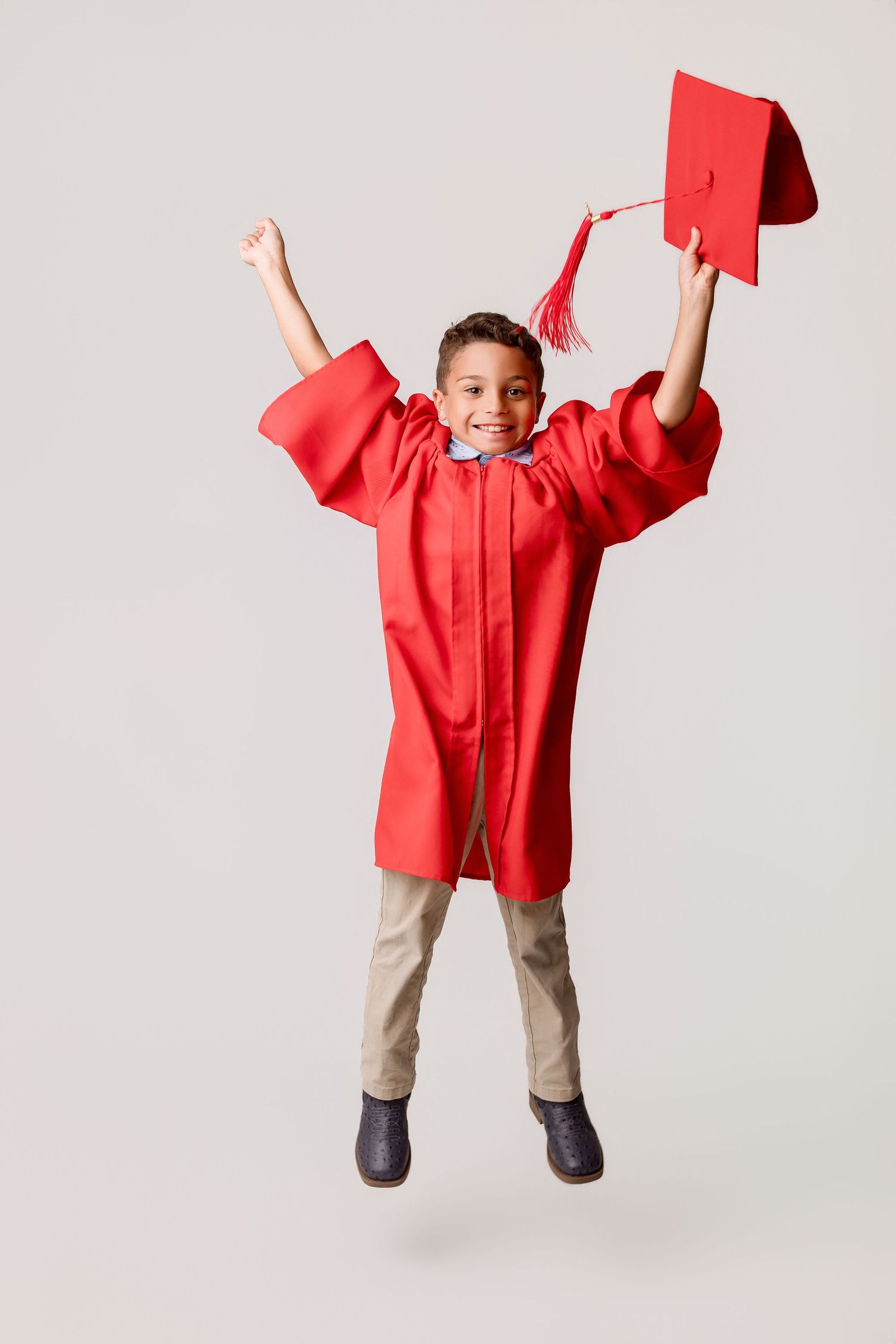 Bridge City kinder graduation portrait session with cap and gown in Port Neches, TX with Bree Elle Photography.