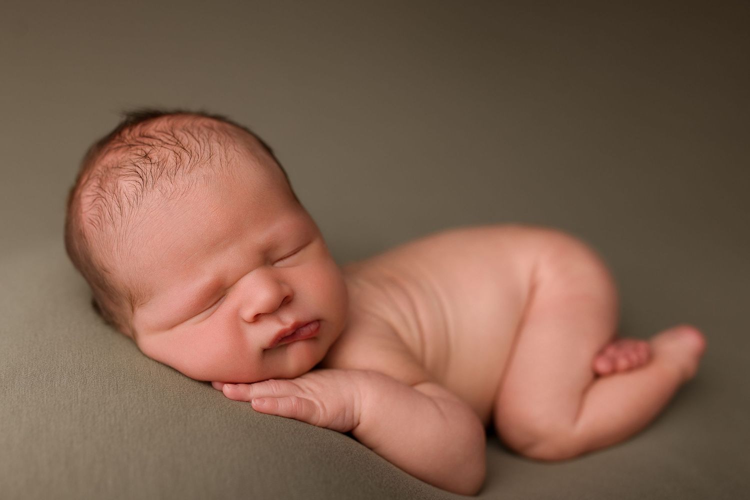 Newborn during session with Bree Elle Photography in Port Neches, TX studio.