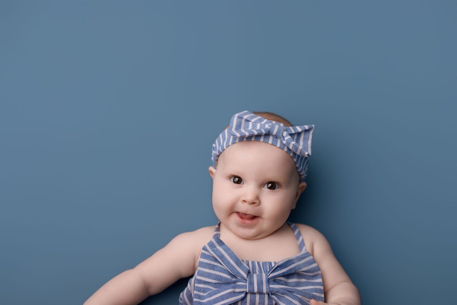 6 month old during her milestone session with Bree Elle Photography in Port Neches, TX studio.