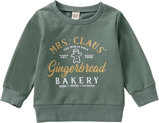 Olive green children's sweatshirt with vintage-style bakery and gingerbread text designs in gold lettering.