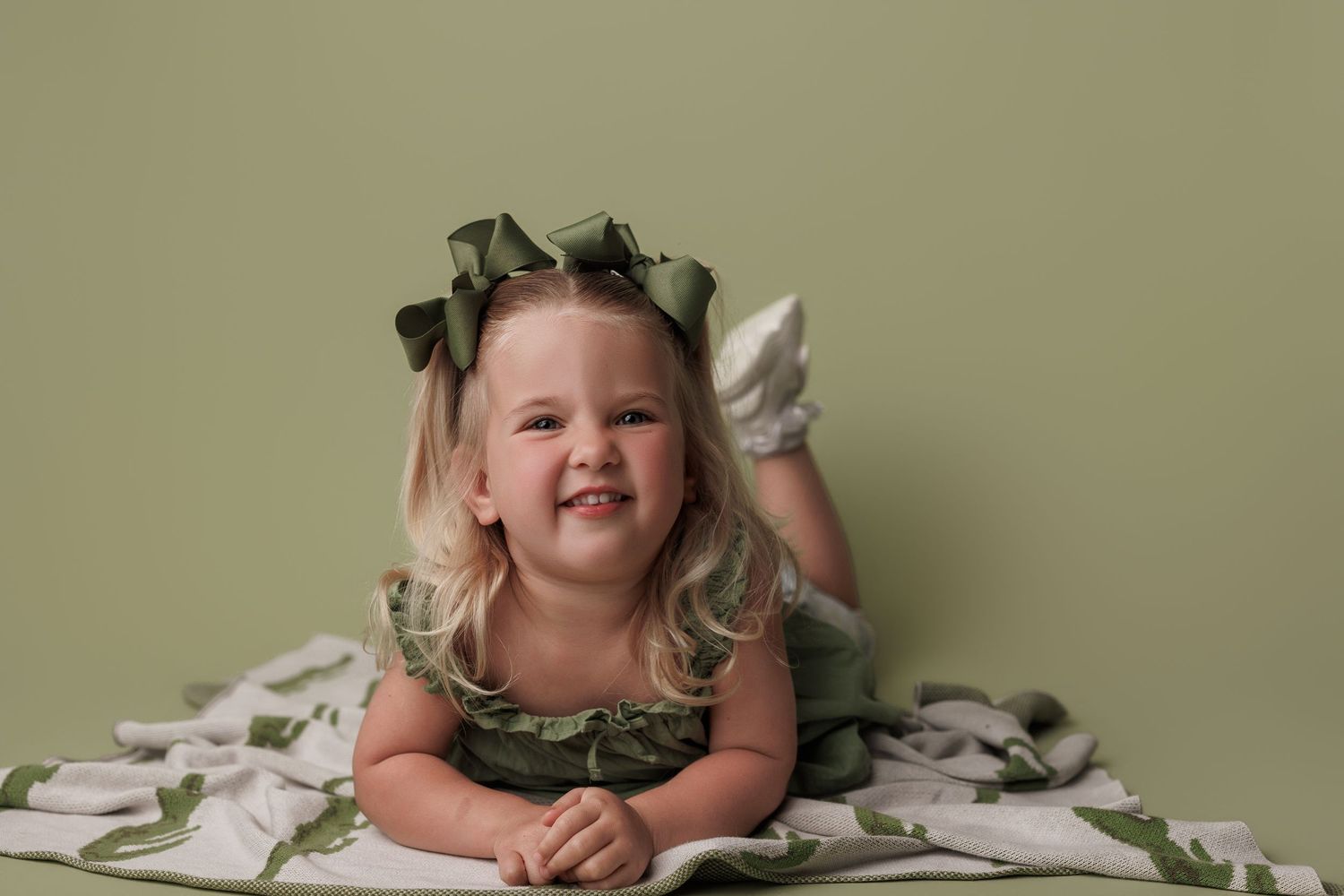 3 year old toddler girl during portrait session at Bree Elle Photography in Port Neches, Tx.