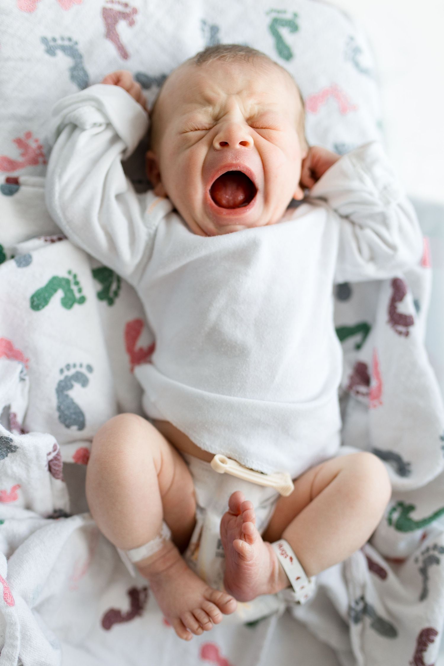 Newborn baby during Fresh 48 session at St. Elizabeth hospital in Beaumont, TX with Bree Elle Photography.