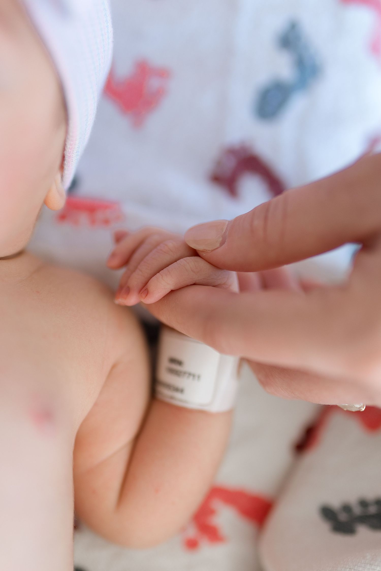 Newborn baby fingers during their Fresh 48 session with Bree Elle Photography in Beaumont, TX at St. Elizabeth hospital.