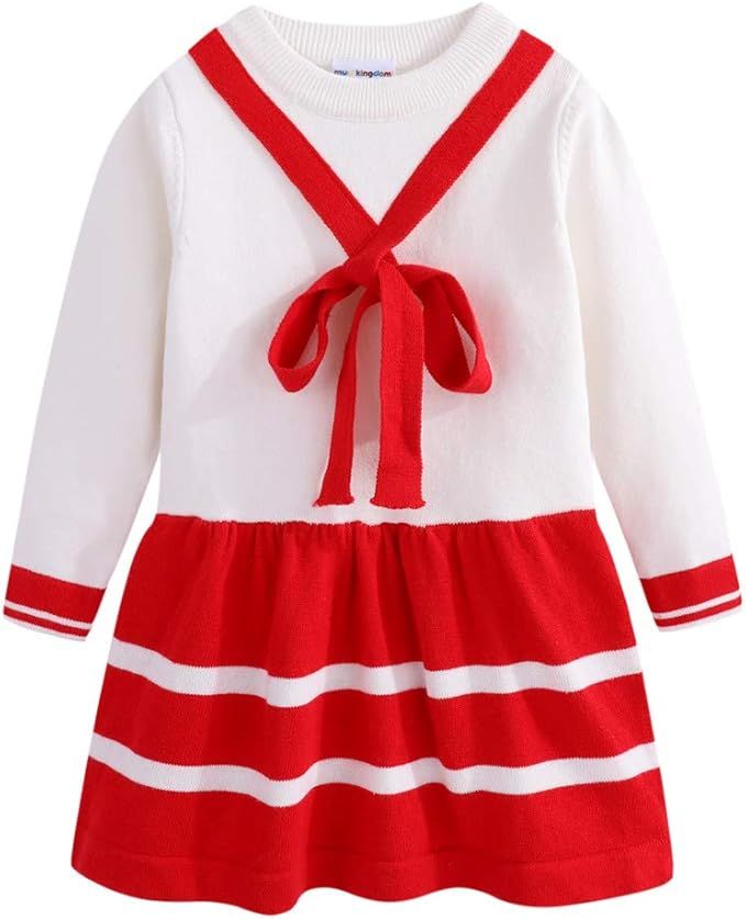 White and red sailor-style dress with long sleeves and decorative bow detail for children.