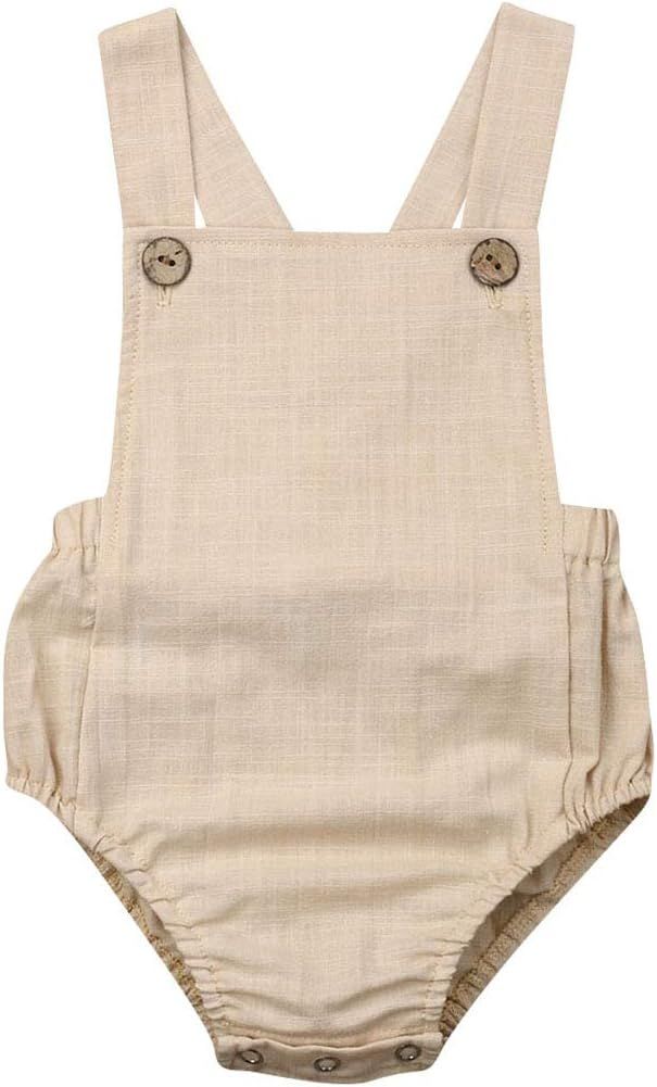 Beige linen baby romper with shoulder straps and decorative buttons shown from multiple angles on white background.