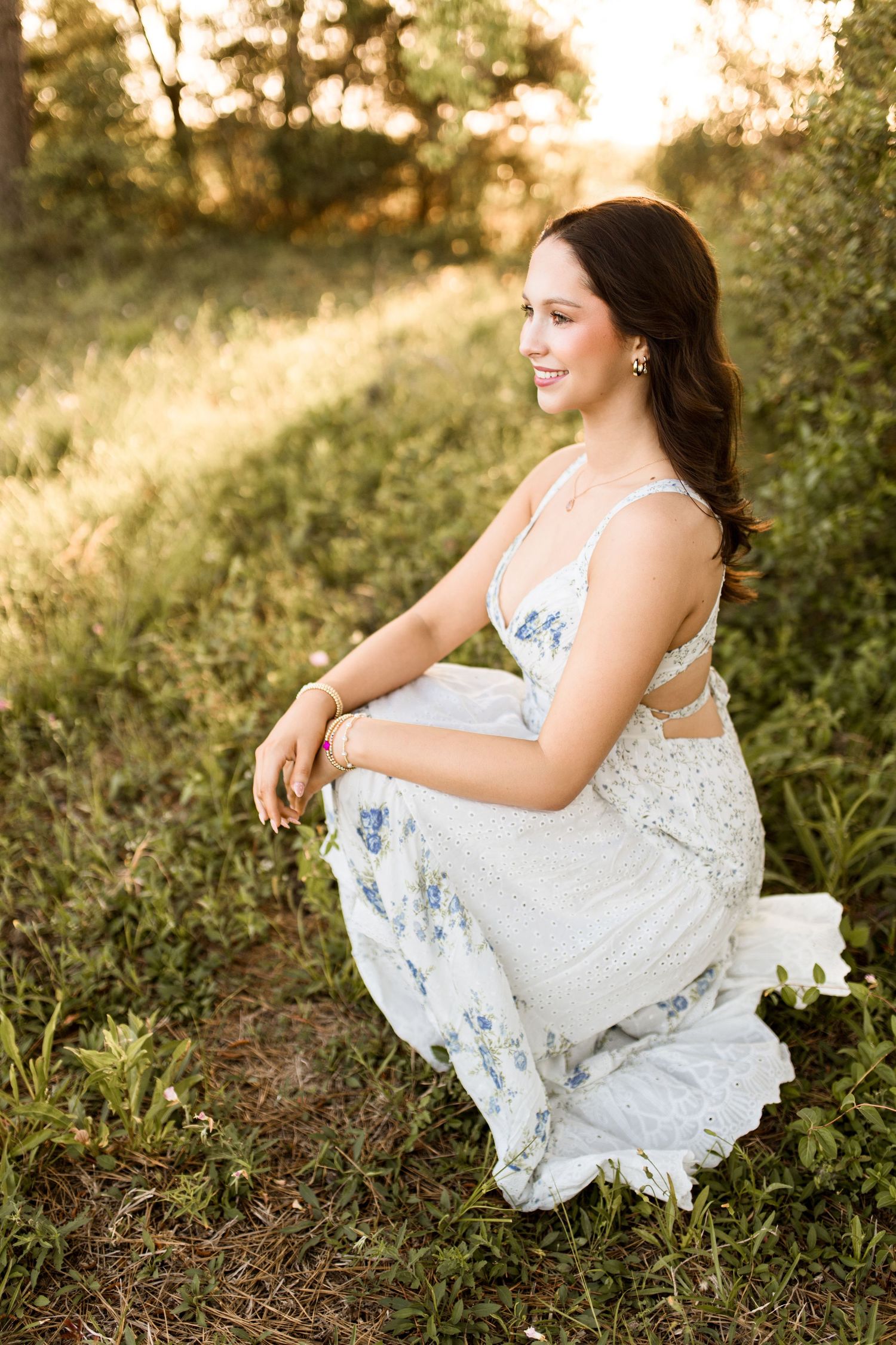 Bree Elle Photography Seniors by Alicia Stephenson. Session with girl in a Beaumont, TX field during senior year photo session.