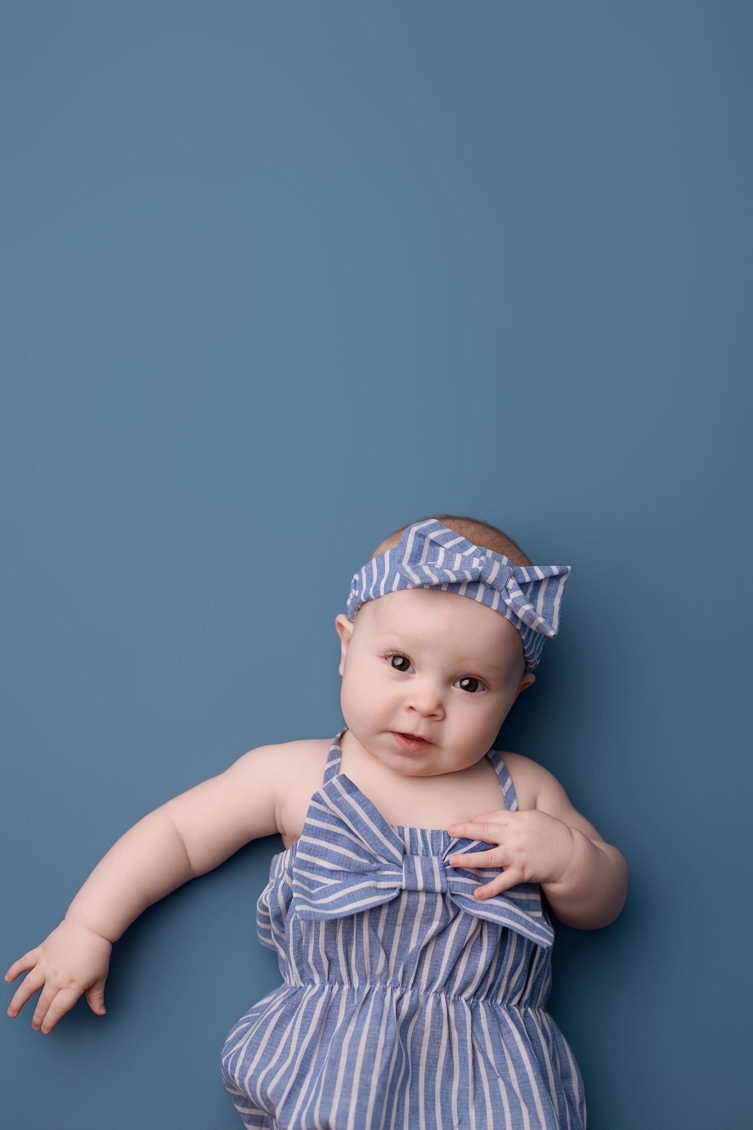 6 month old during her milestone session with Bree Elle Photography in Port Neches, TX studio.