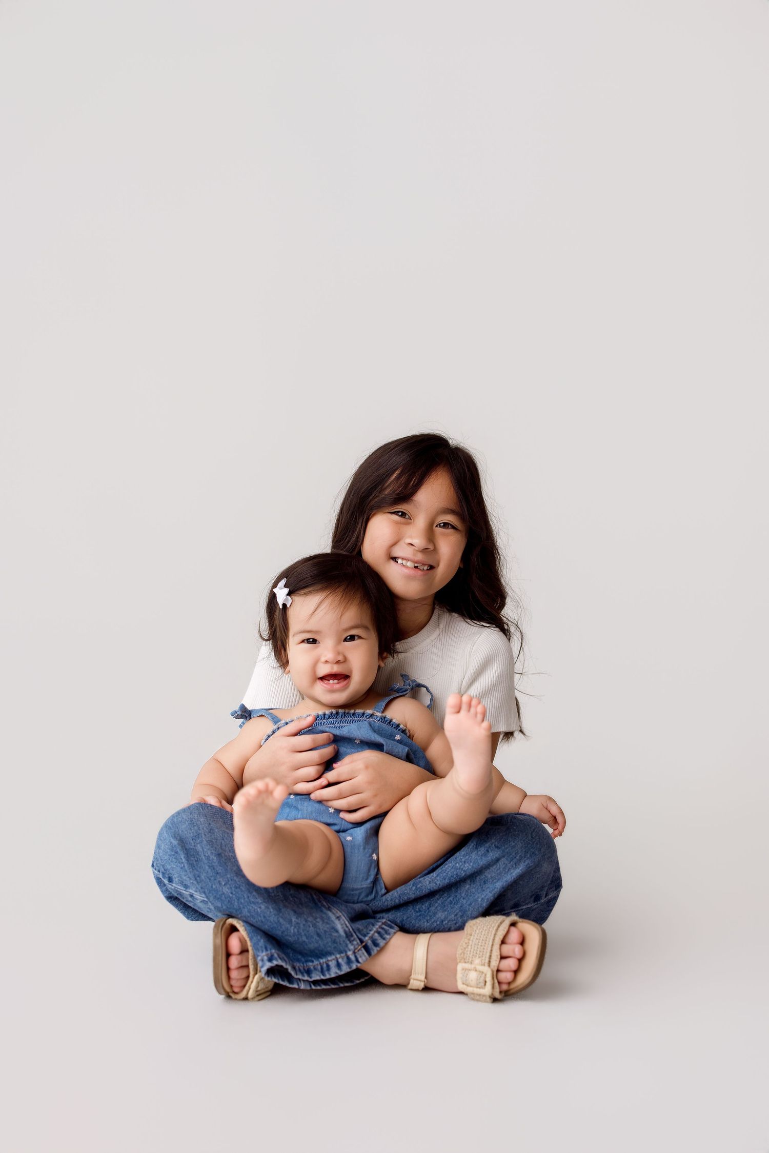 One year old family portion with sibling during one year session Bree Elle Photography in Port Neches, TX.