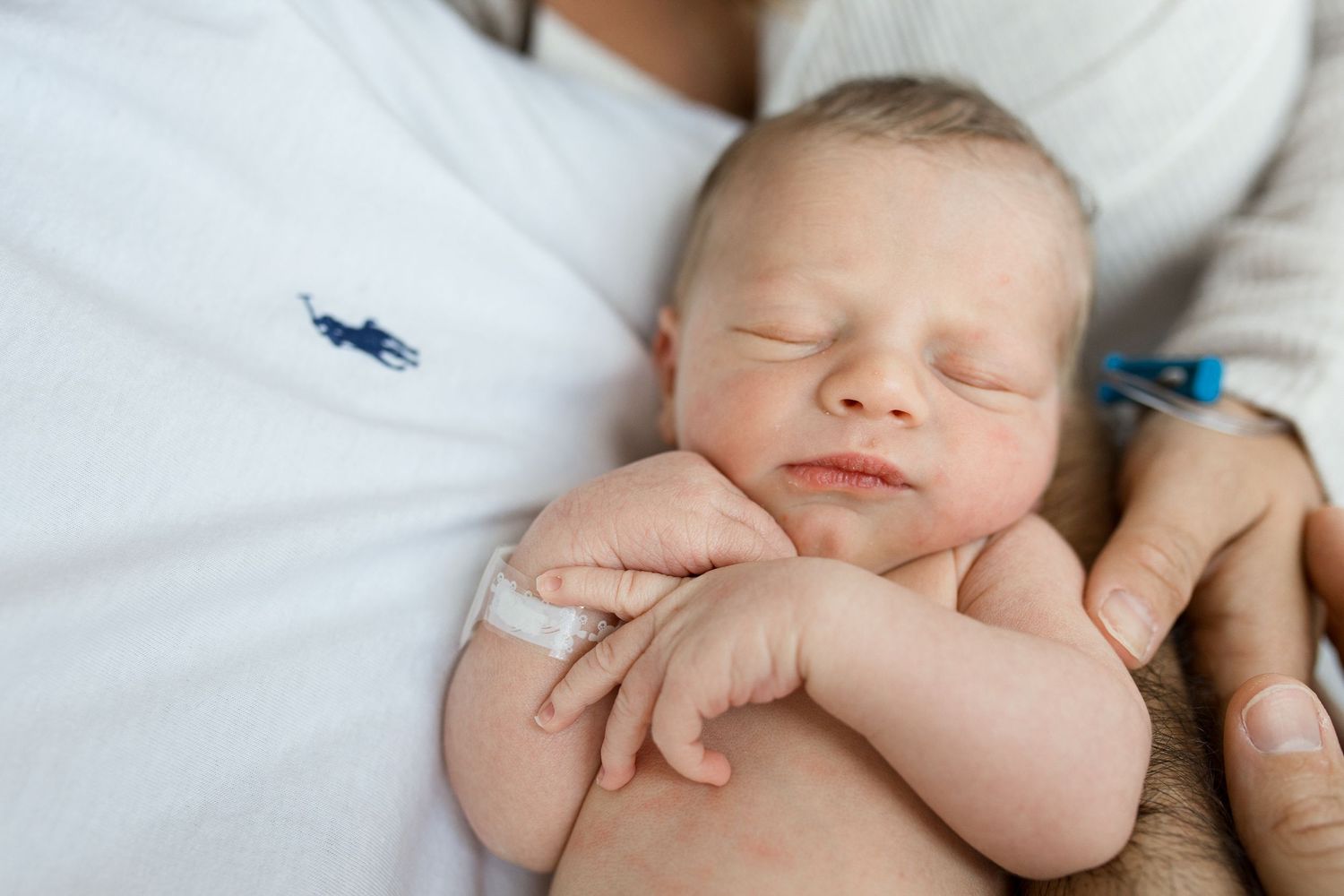 Newborn baby during Fresh 48 session at St. Elizabeth hospital in Beaumont, TX with Bree Elle Photography.