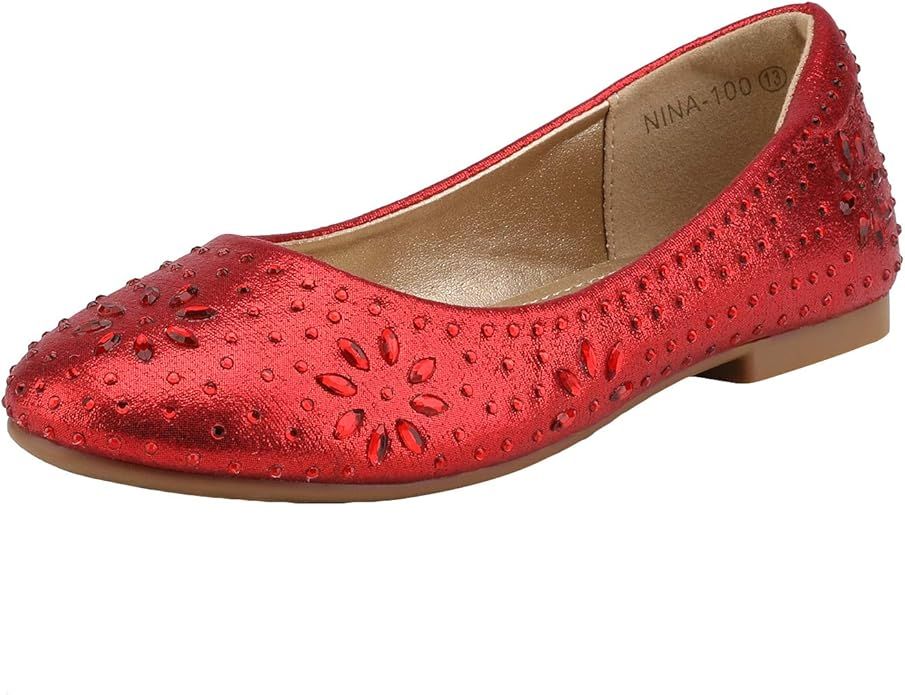 Red leather ballet flat with laser-cut floral pattern and metallic studs shown from multiple angles.