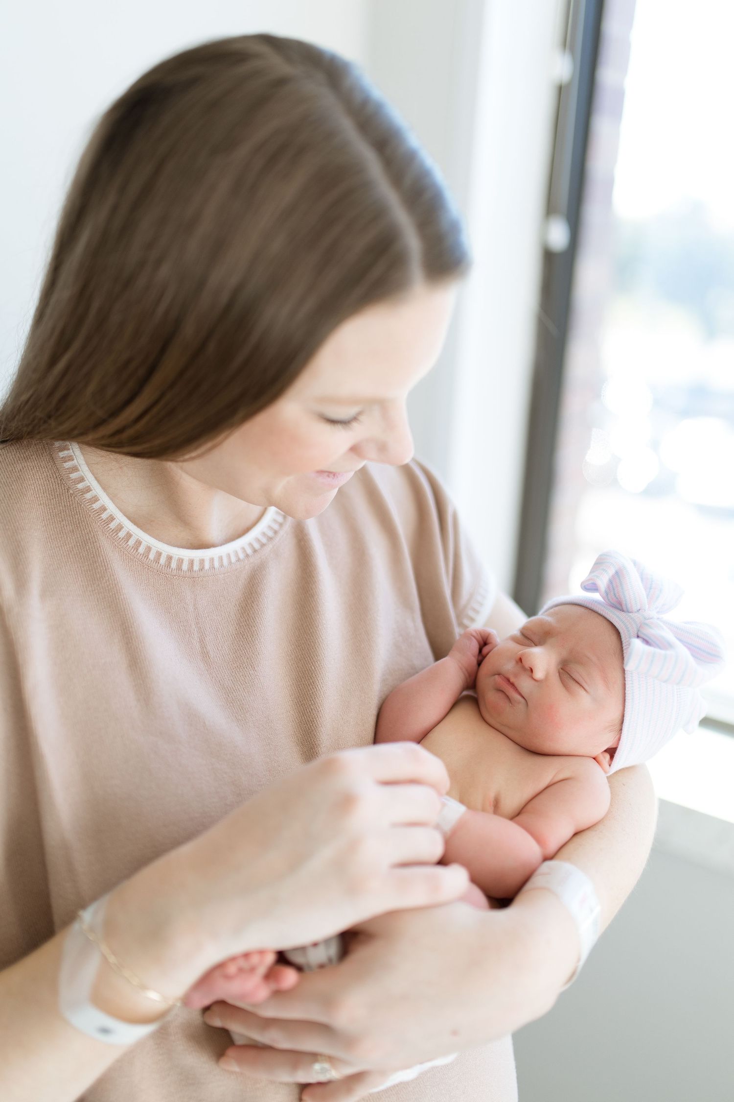 Newborn baby during their Fresh 48 session with Bree Elle Photography in Beaumont, TX at St. Elizabeth hospital.