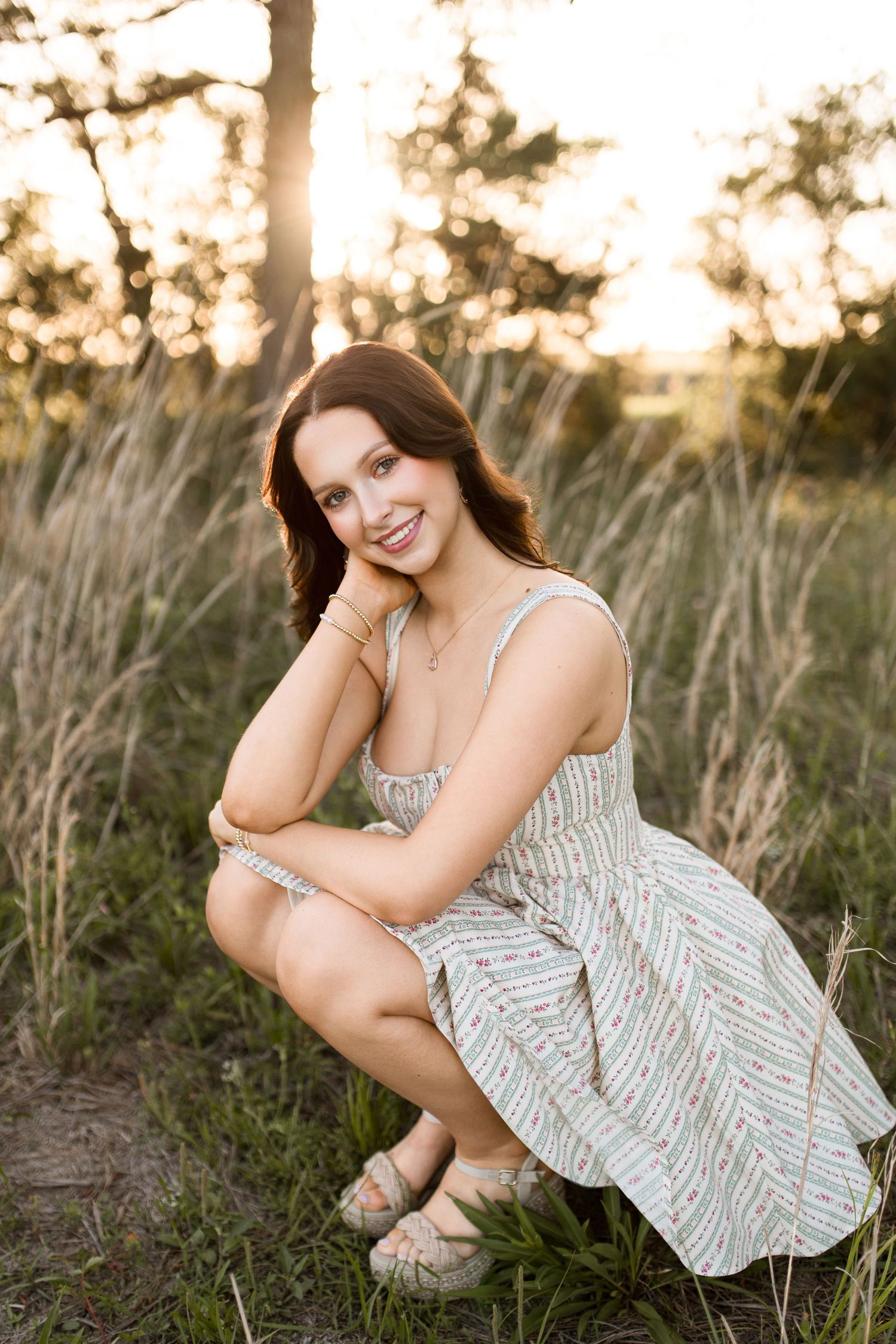 Bree Elle Photography Seniors by Alicia Stephenson. Session with girl in a Beaumont, TX field during senior year photo session.