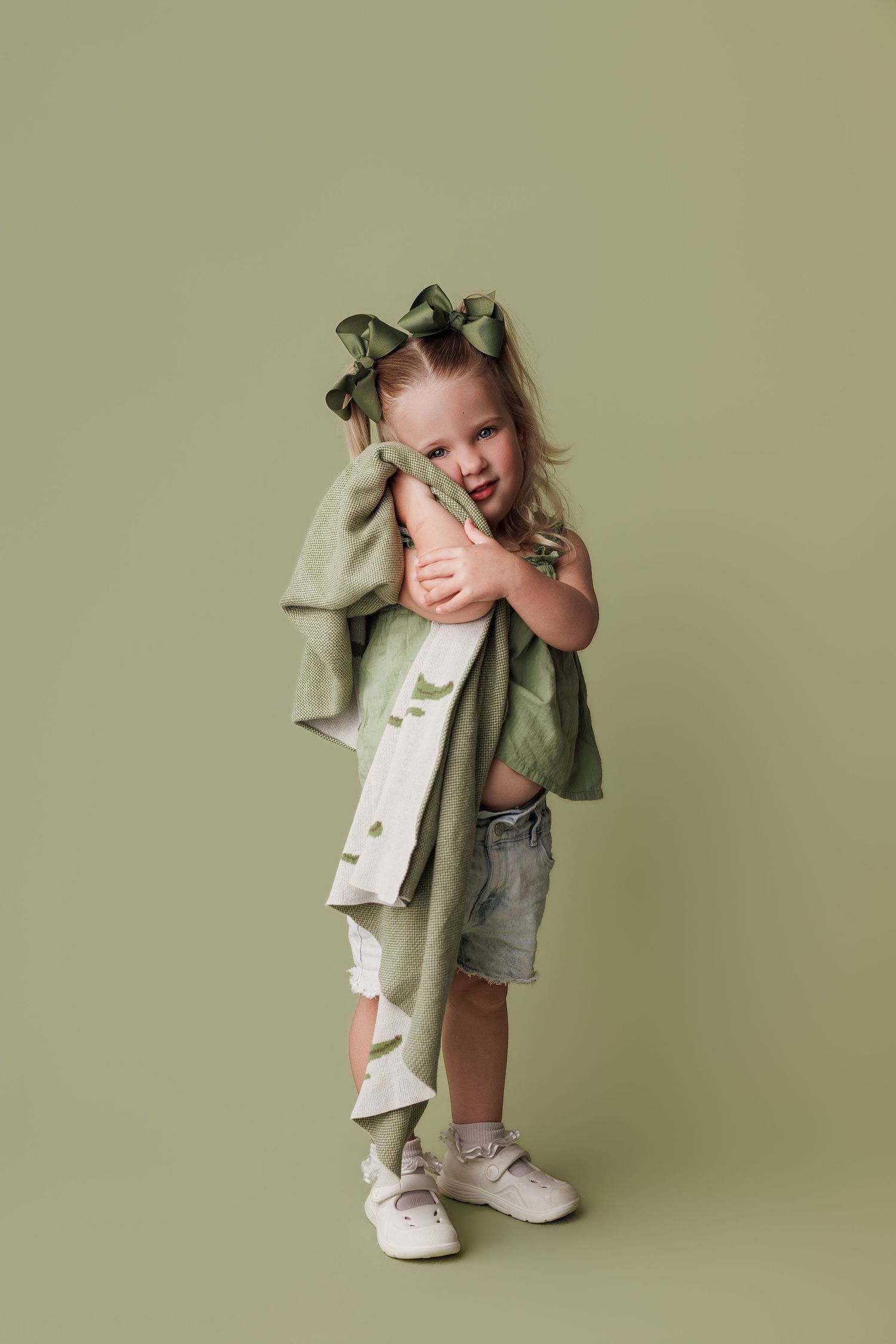 3 year old toddler girl during portrait session at Bree Elle Photography in Port Neches, Tx.
