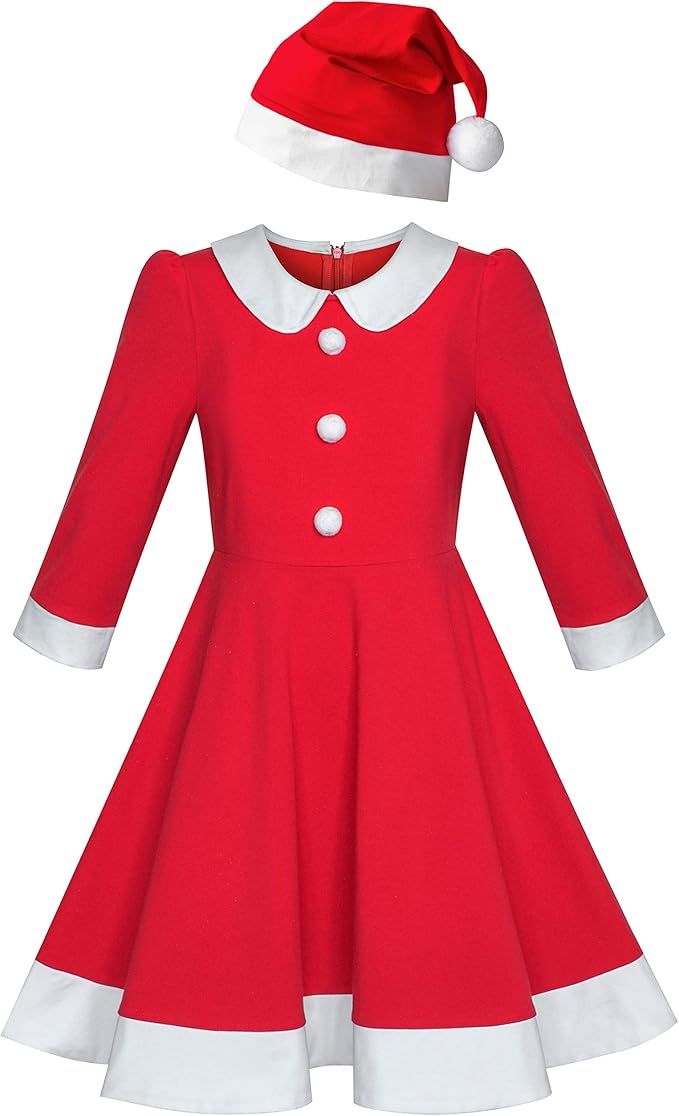 Red and white Christmas Santa dress with white collar and matching hat isolated on white background.