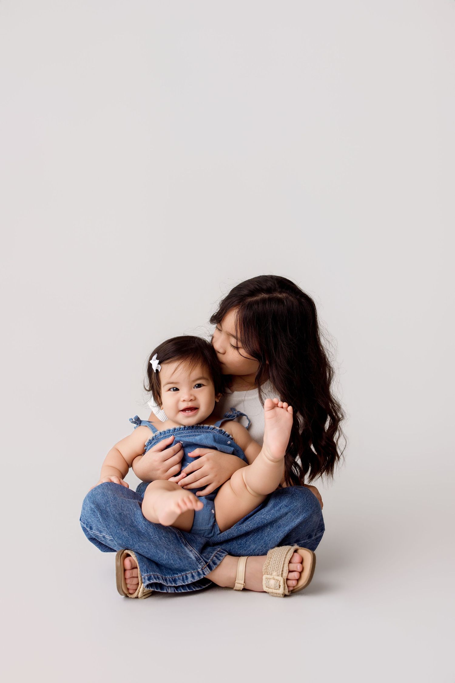 One year old family portion with sibling during one year session Bree Elle Photography in Port Neches, TX.
