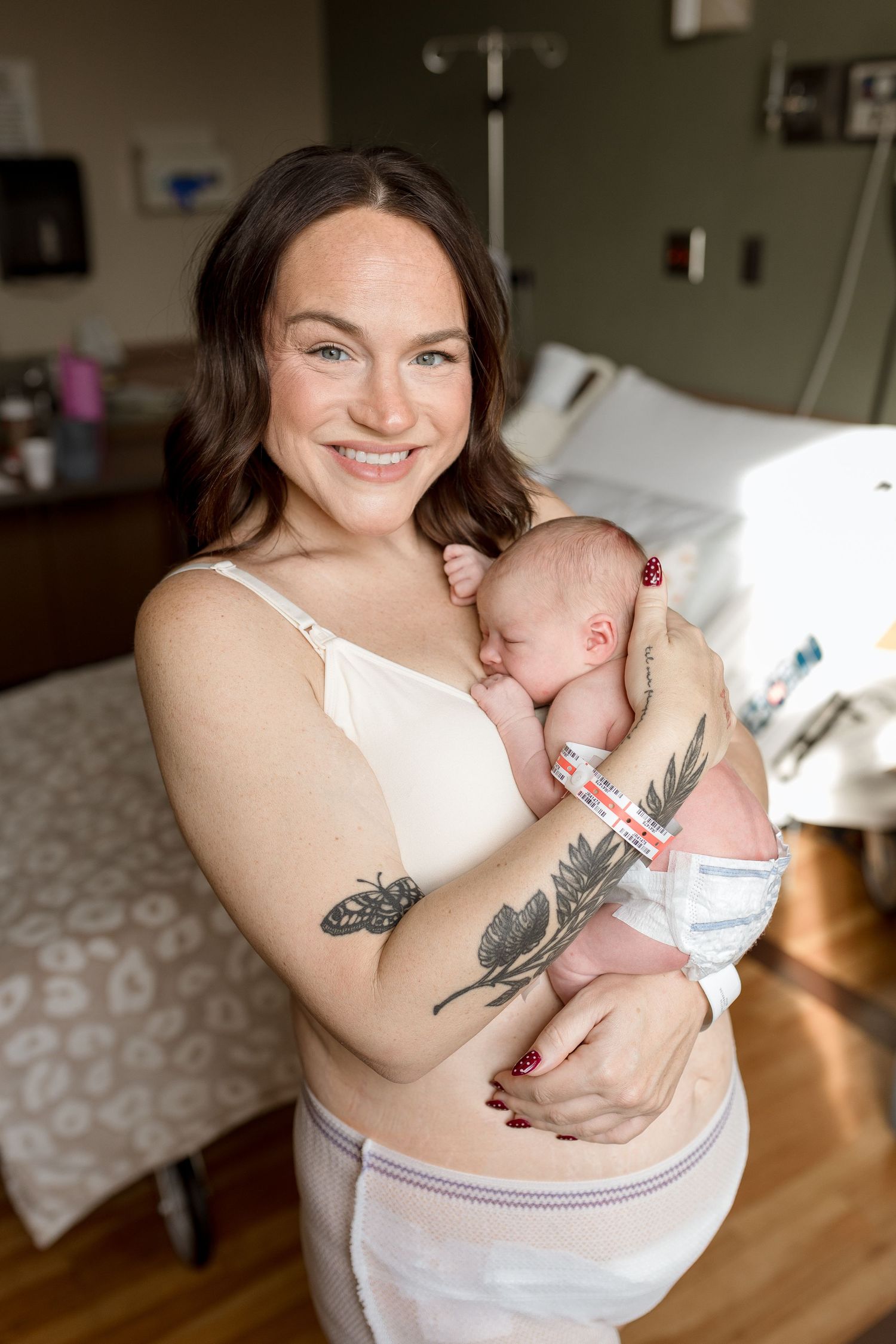 Photo showing skin-to-skin bonding moments between parent and newborn in natural light during Fresh 48 session in Beaumont hospital.