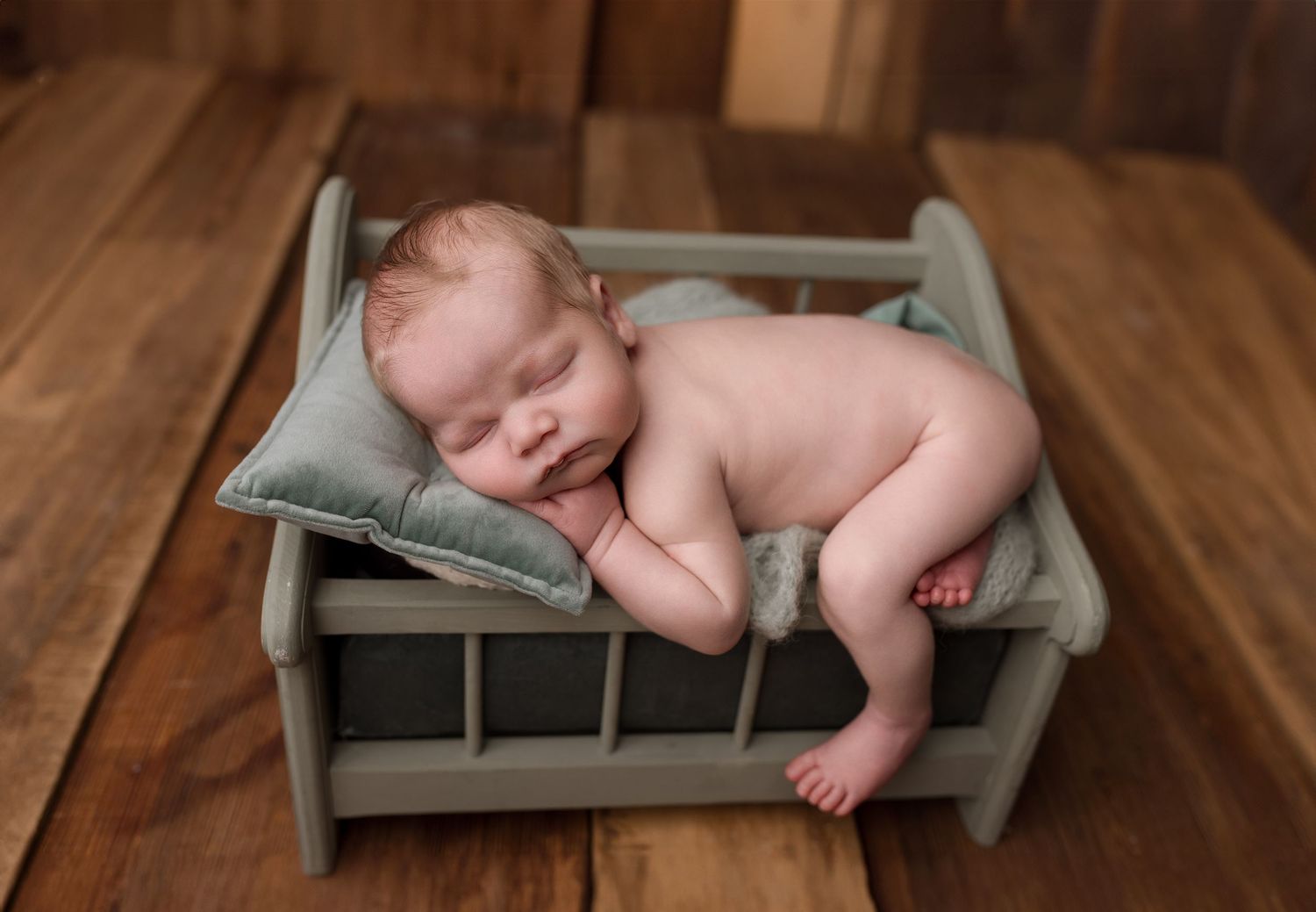 Newborn baby during newborn session with Bree Elle Photography in Port Neches, TX studio. Lumberton, Silsbee, Beaumont, Nederland, Southeast