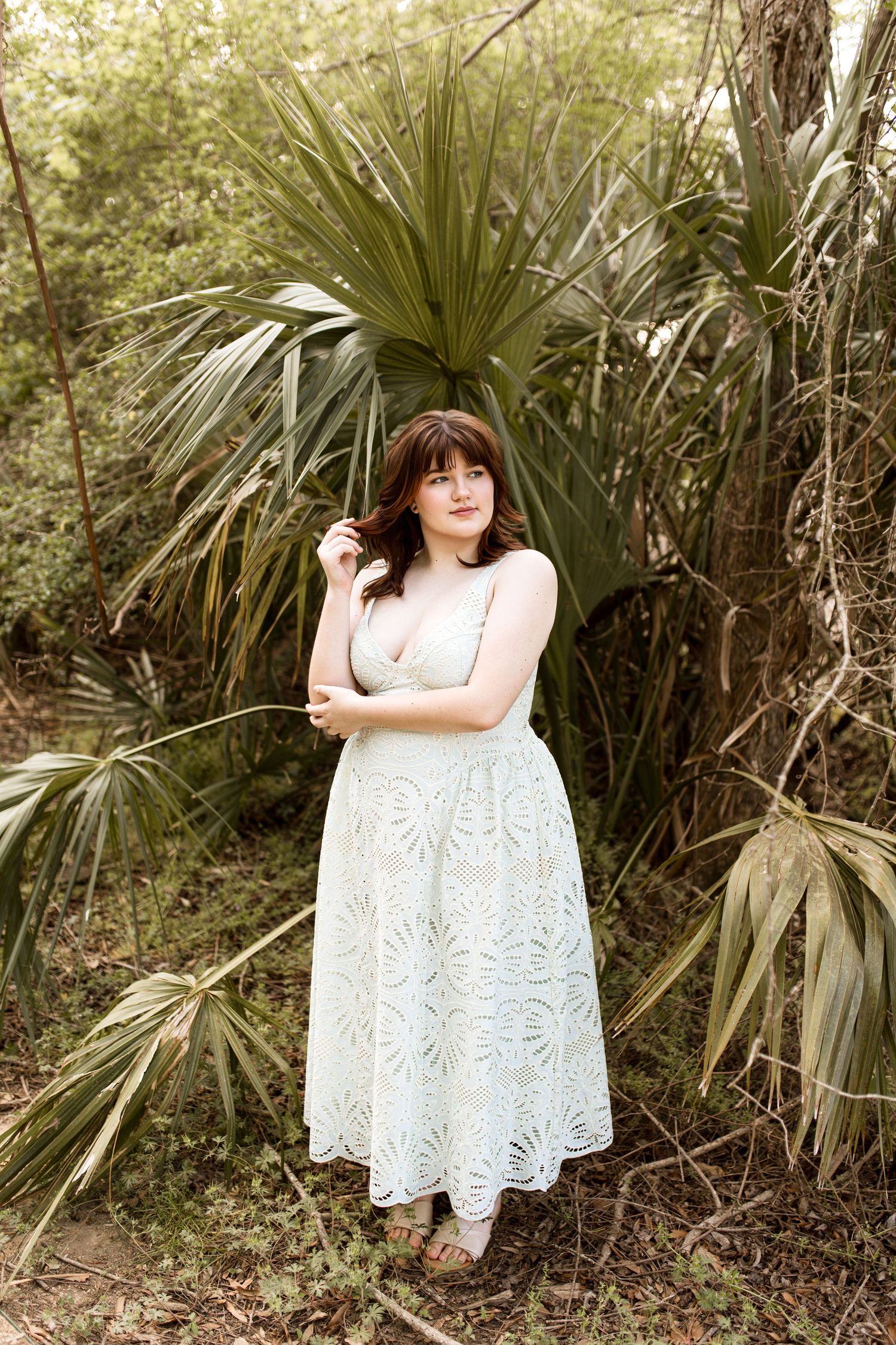 Bree Elle Photography by Alicia Stephenson with graduating senior in a park in Orange, TX.