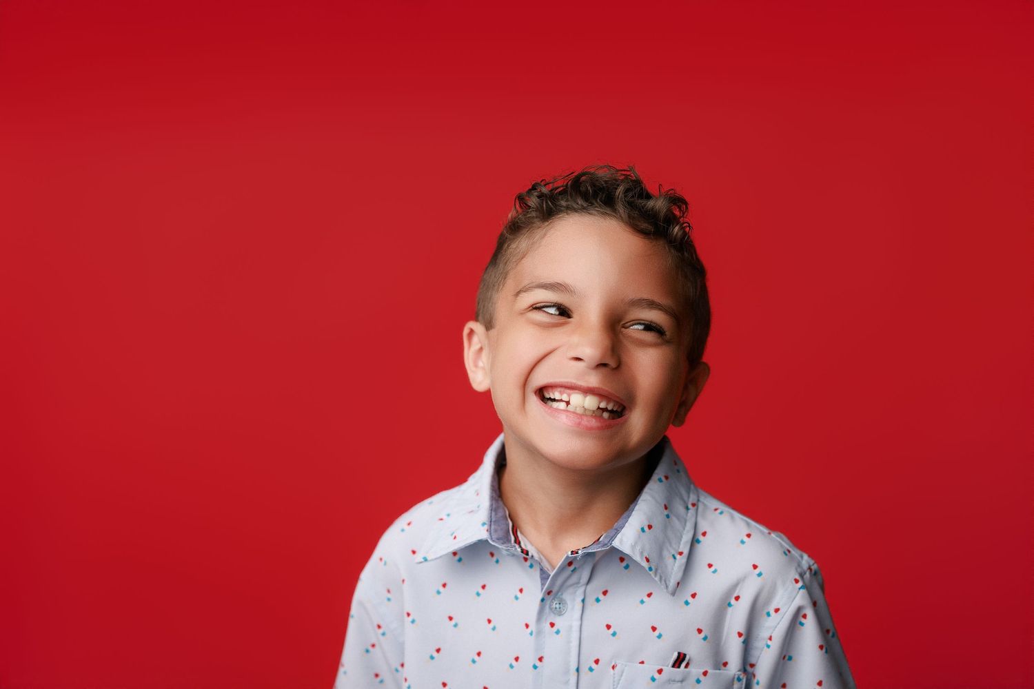 Bridge City kinder graduation portrait session with cap and gown in Port Neches, TX with Bree Elle Photography.