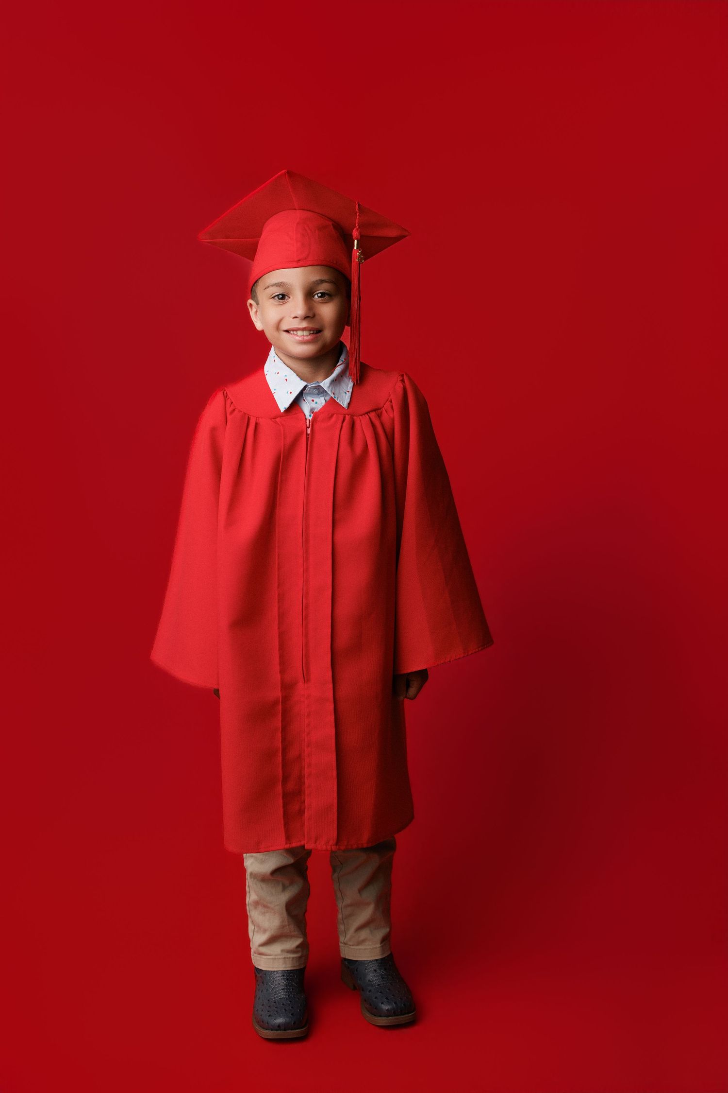 Bridge City kinder graduation portrait session with cap and gown in Port Neches, TX with Bree Elle Photography.