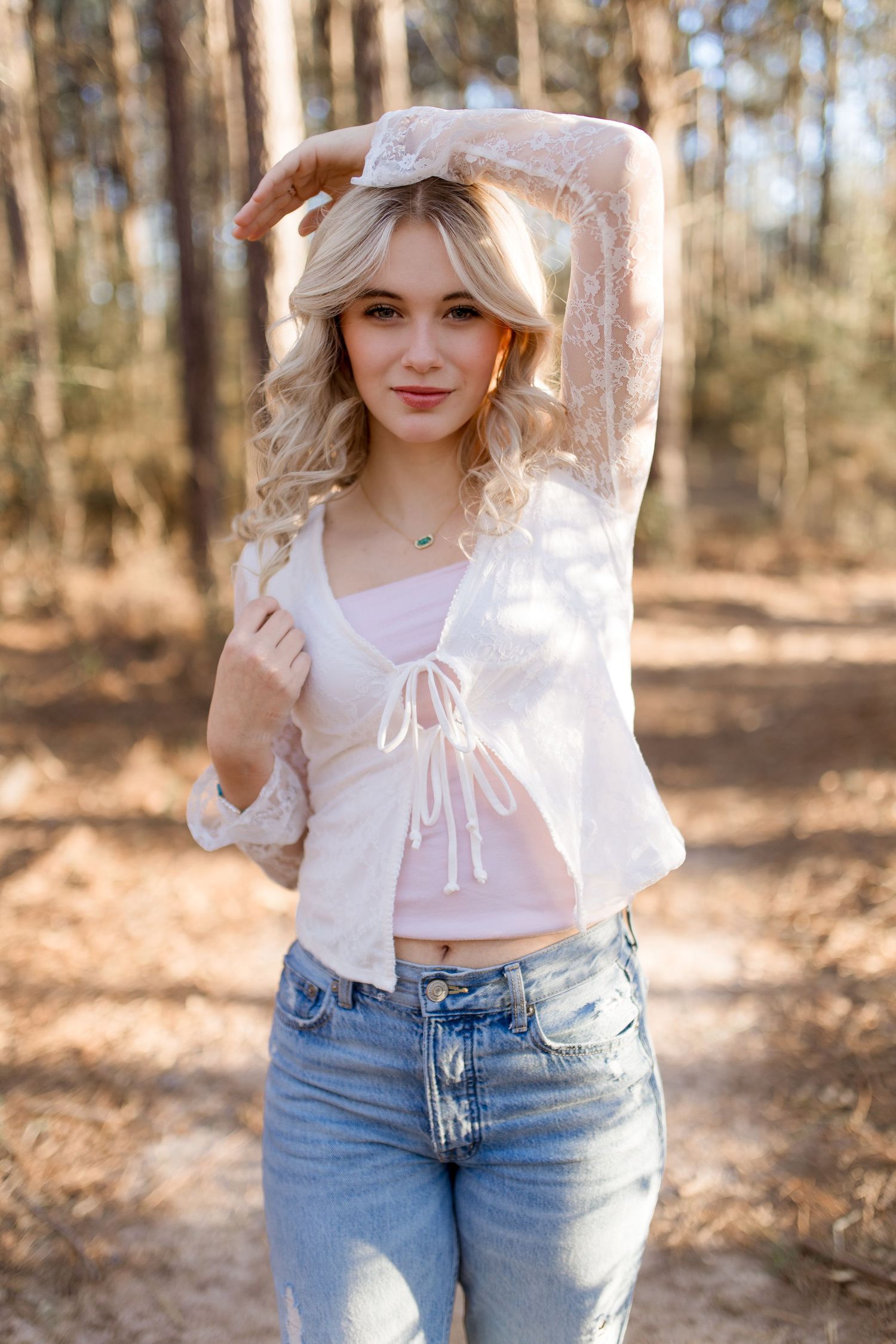 High School Senior taking graduation photos in Silsbee, TX with Bree Elle Photography's associate photographer, Alicia.