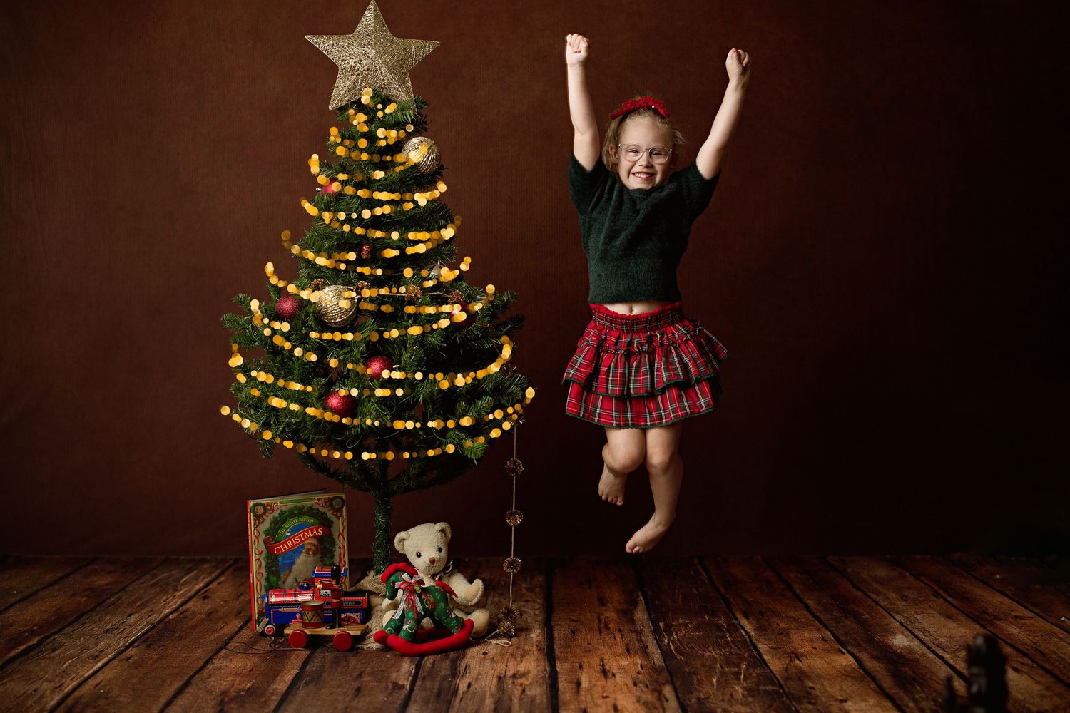 A series of Christmas photos showing decorated trees and festive scenes with a vintage brown backdrop.