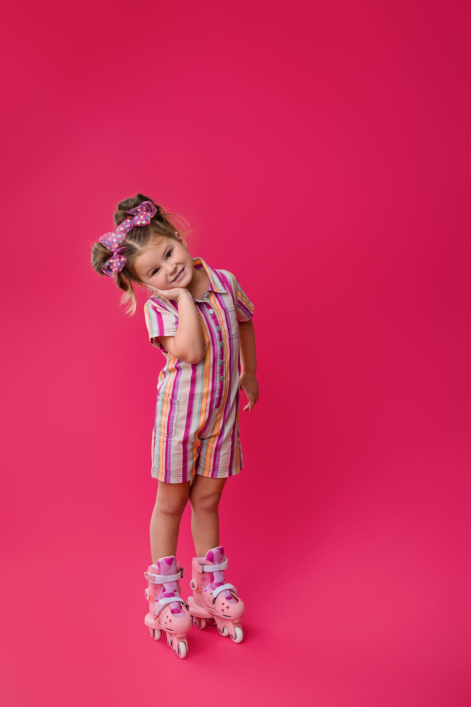 Four sequential fashion shots against a pink background show a playful pose wearing roller skates and summer attire.