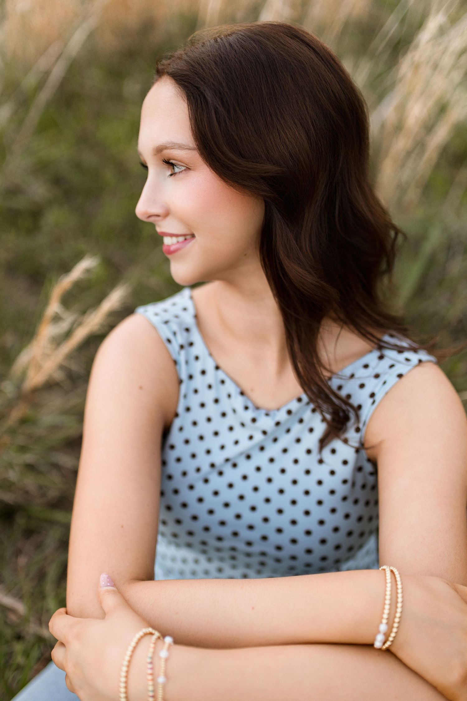 Bree Elle Photography Seniors by Alicia Stephenson. Session with girl in a Beaumont, TX field during senior year photo session.