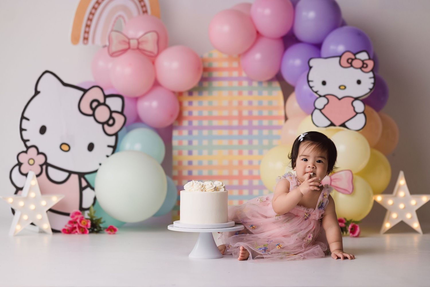 One year old during her themed cake smash session with Bree Elle Photography in Port Neches, TX.