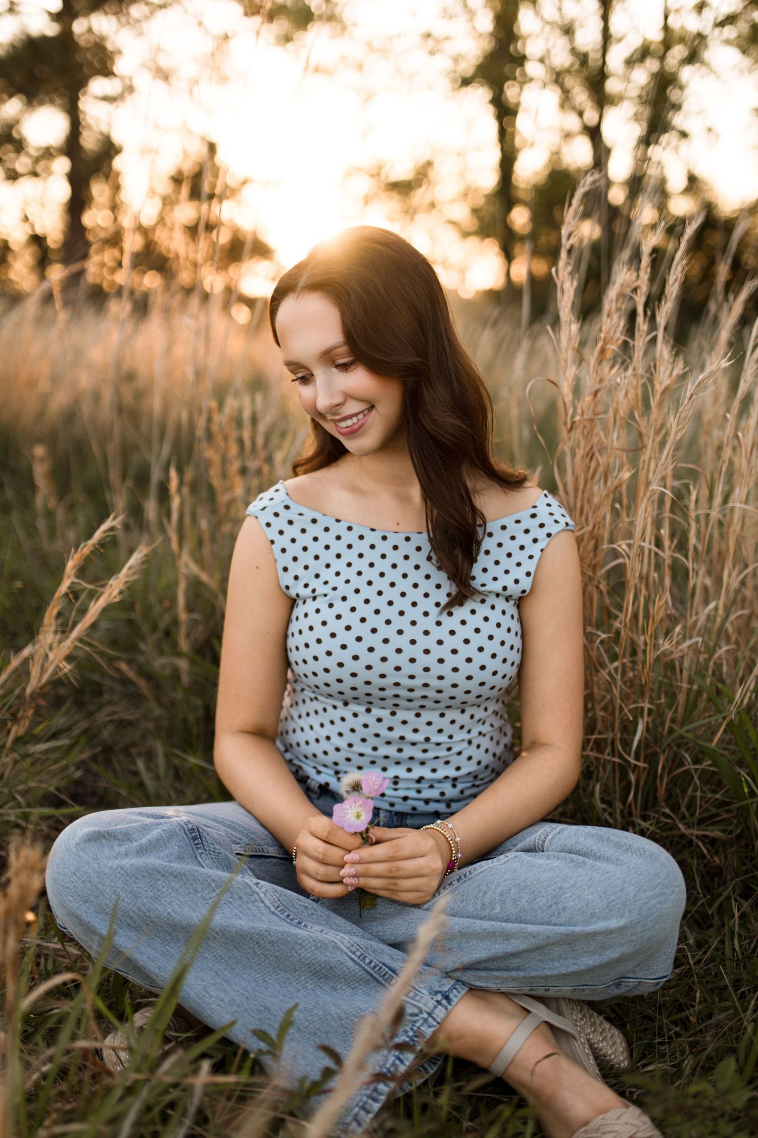 Bree Elle Photography Seniors by Alicia Stephenson. Session with girl in a Beaumont, TX field during senior year photo session.