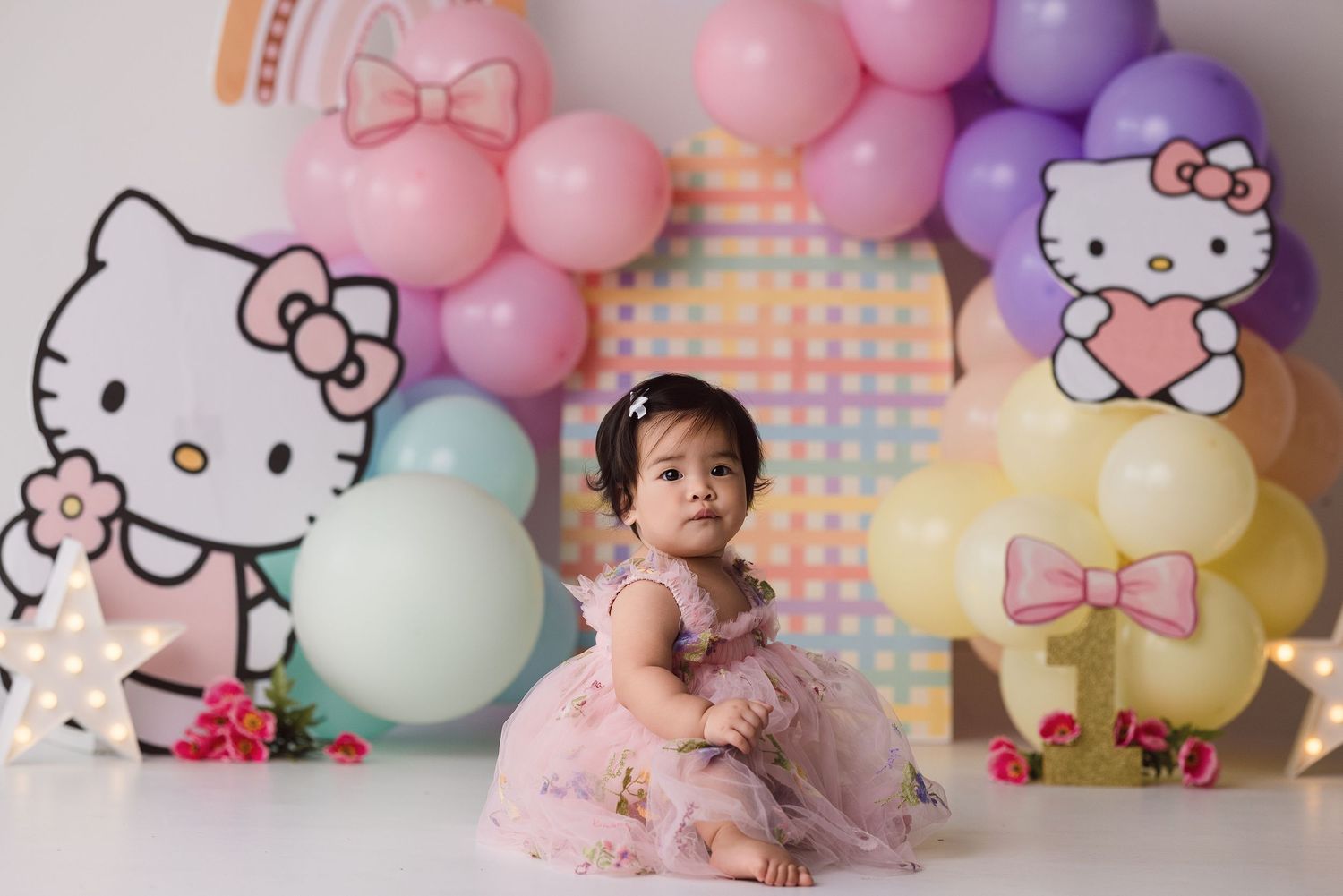 One year old during her themed cake smash session with Bree Elle Photography in Port Neches, TX.