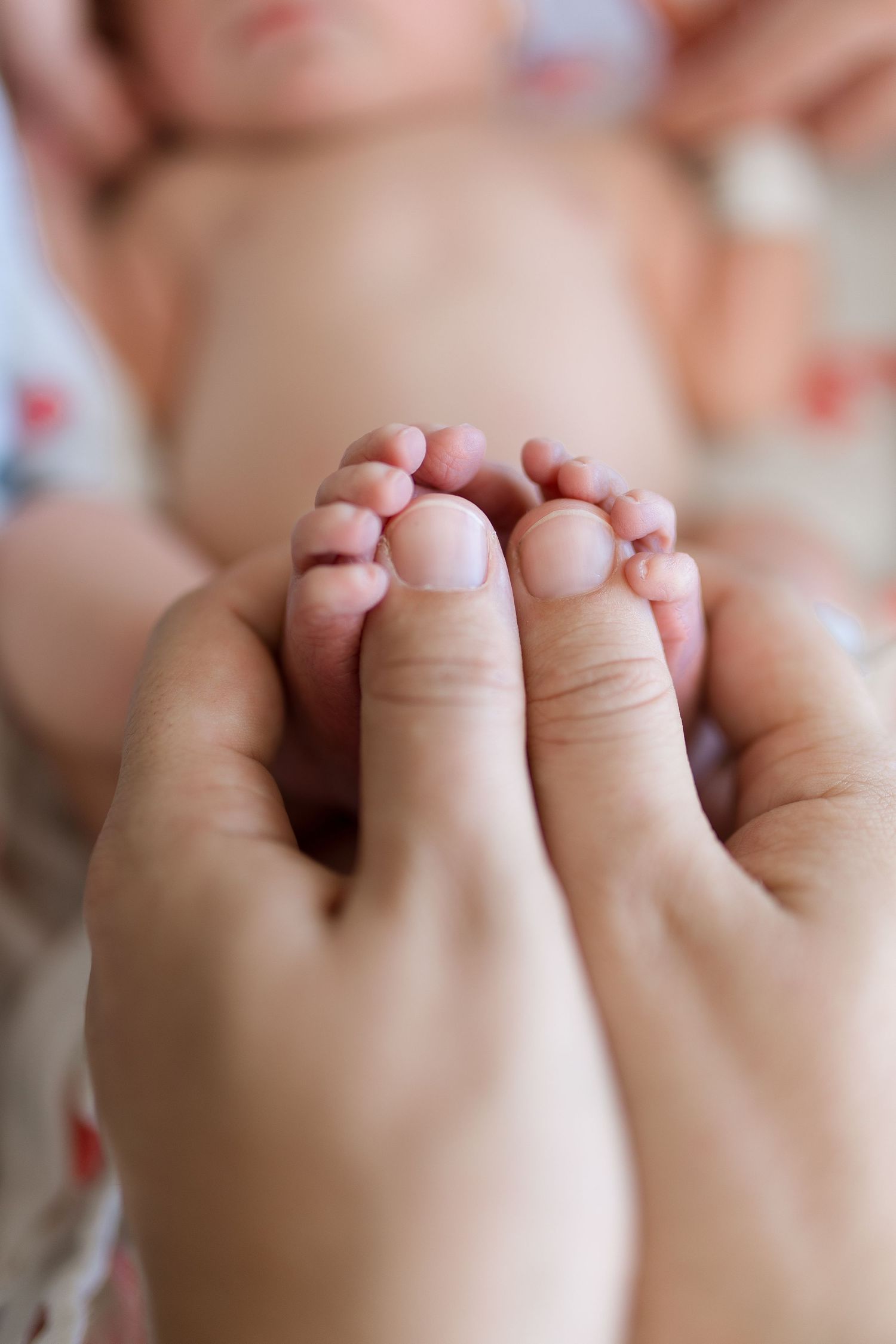 Close-up macro shot of tiny baby fingers and toes in soft natural lighting during Fresh 48 with Bree Elle Photography in Beaumont, TX.