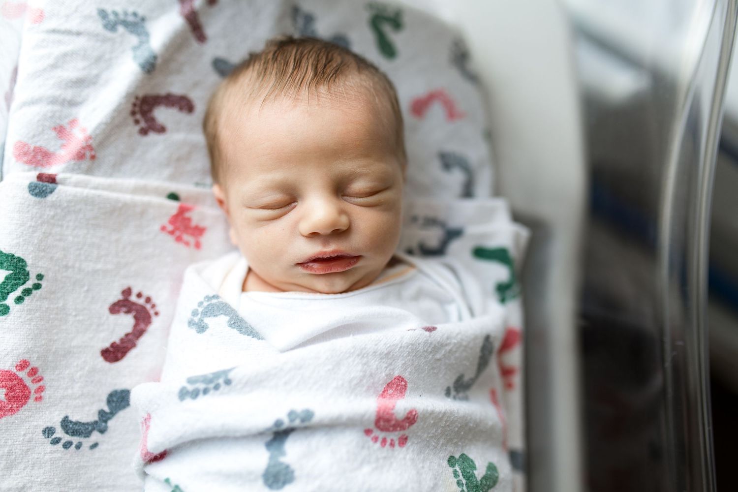 Newborn baby during Fresh 48 session with Bree Elle Photography in Beaumont, TX.