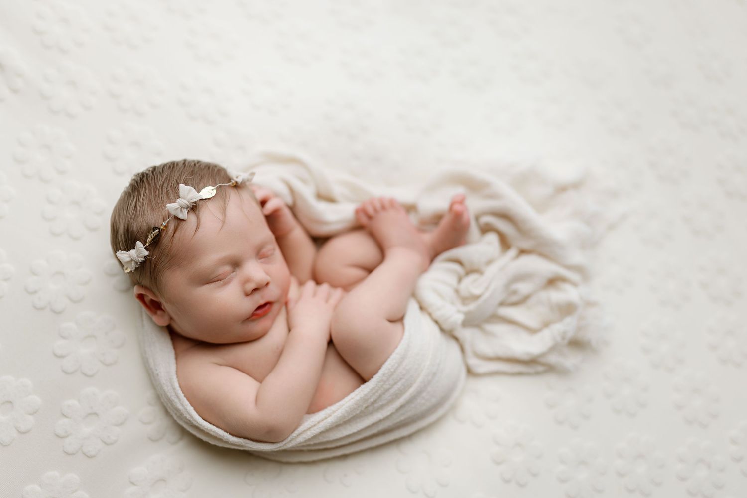 Newborn baby during photography session in Port Neches with Bree Elle Photography