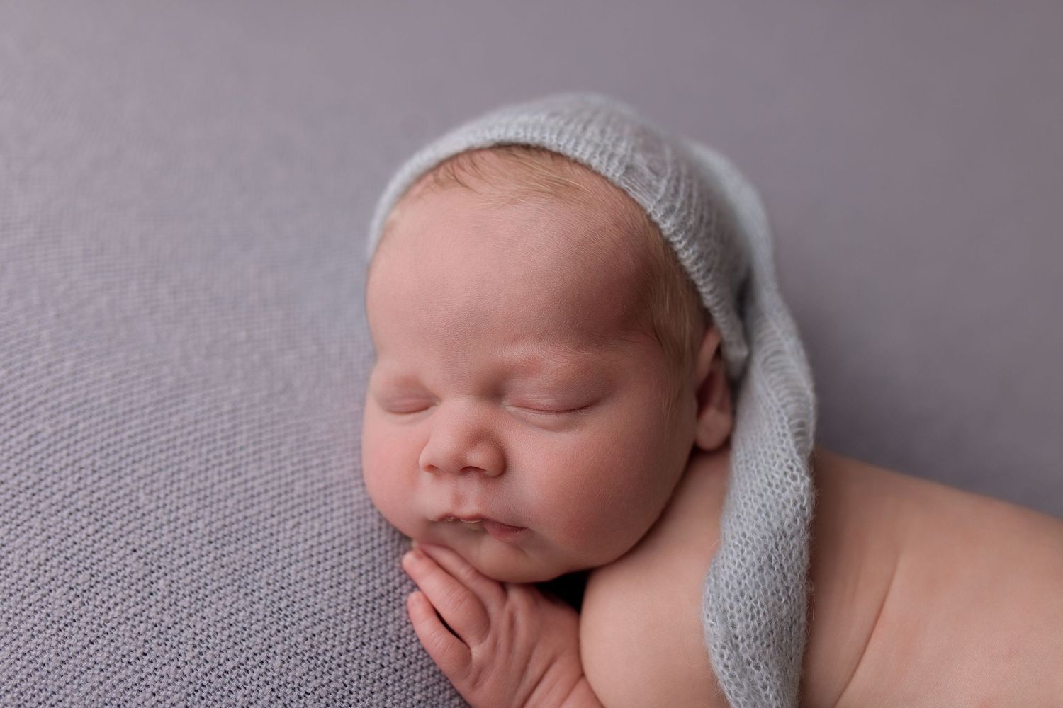 Newborn baby during newborn session with Bree Elle Photography in Port Neches, TX studio. Lumberton, Silsbee, Beaumont, Nederland, Southeast