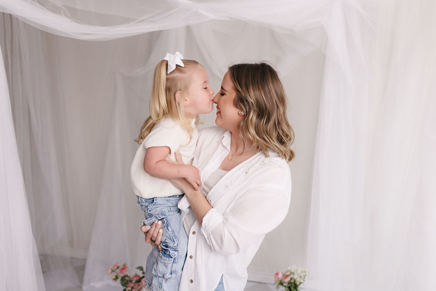 Mother and daughter during mommy and me session in Port Neches, TX studio.