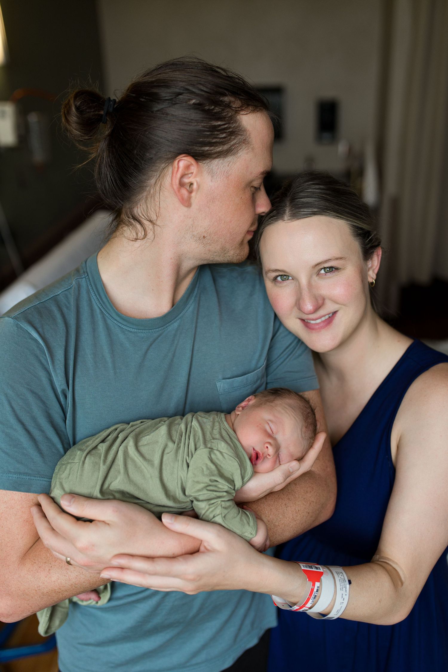 Newborn baby and parents during Fresh 48 at Baptist hospital in Beaumont, TX with Bree Elle Photography.