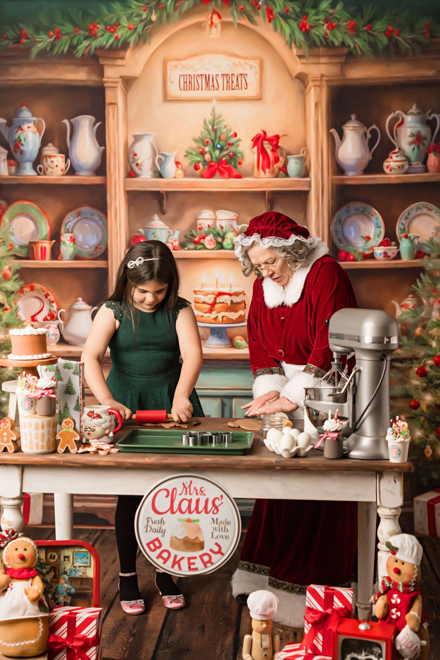 Holiday baking scene in front of shelves filled with vintage teapots and Christmas decorations.