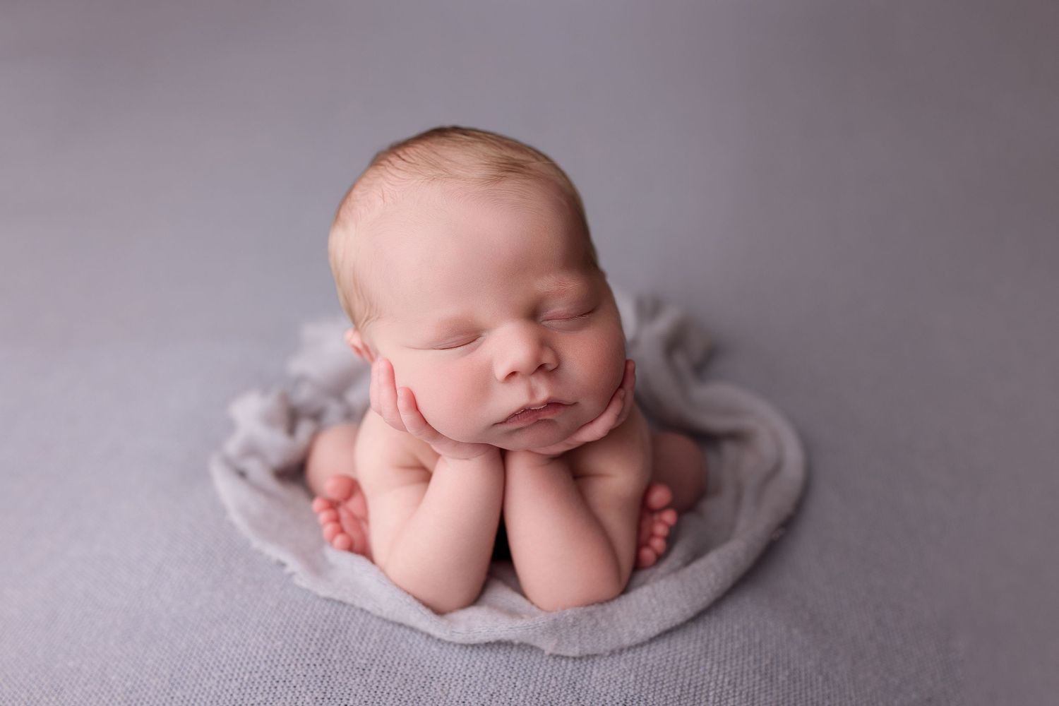 Newborn baby during newborn session with Bree Elle Photography in Port Neches, TX studio. Lumberton, Silsbee, Beaumont, Nederland, Southeast