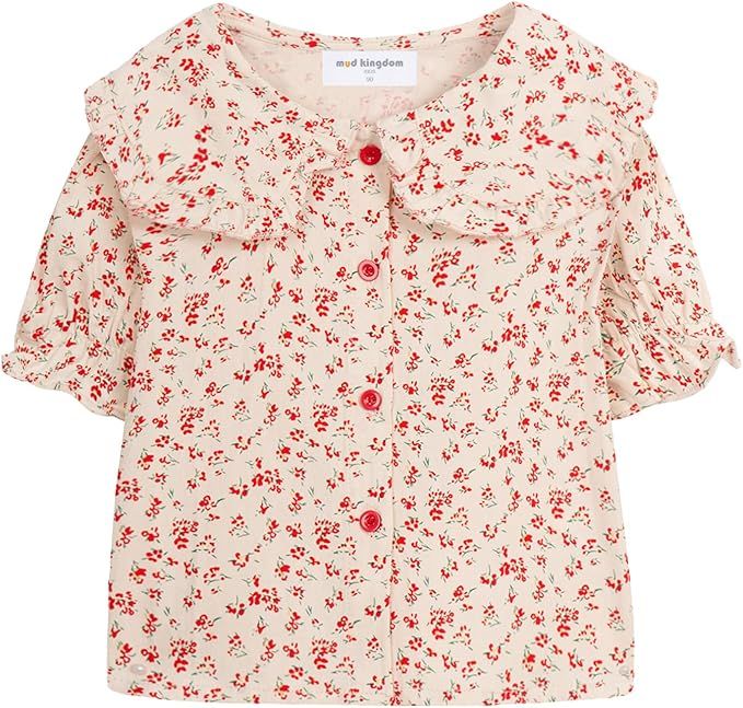 A cream-colored cropped jacket with delicate red floral print pattern and short sleeves lying flat on a white surface.