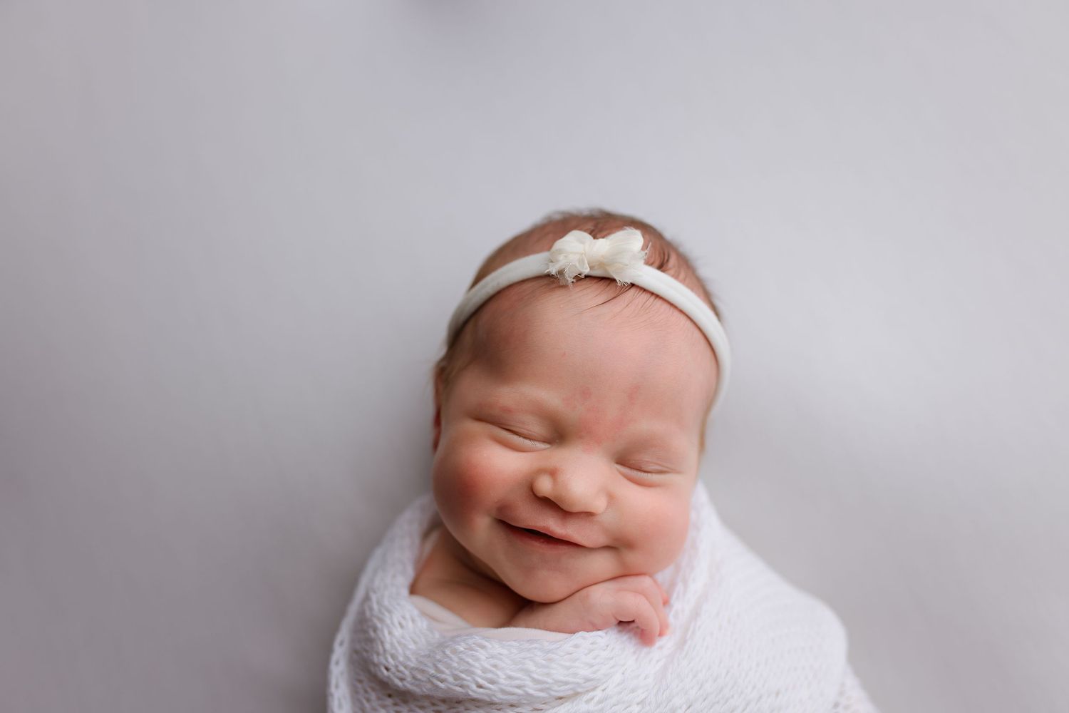 Newborn baby during studio session in Nederland, TX with Bree Elle Photography.