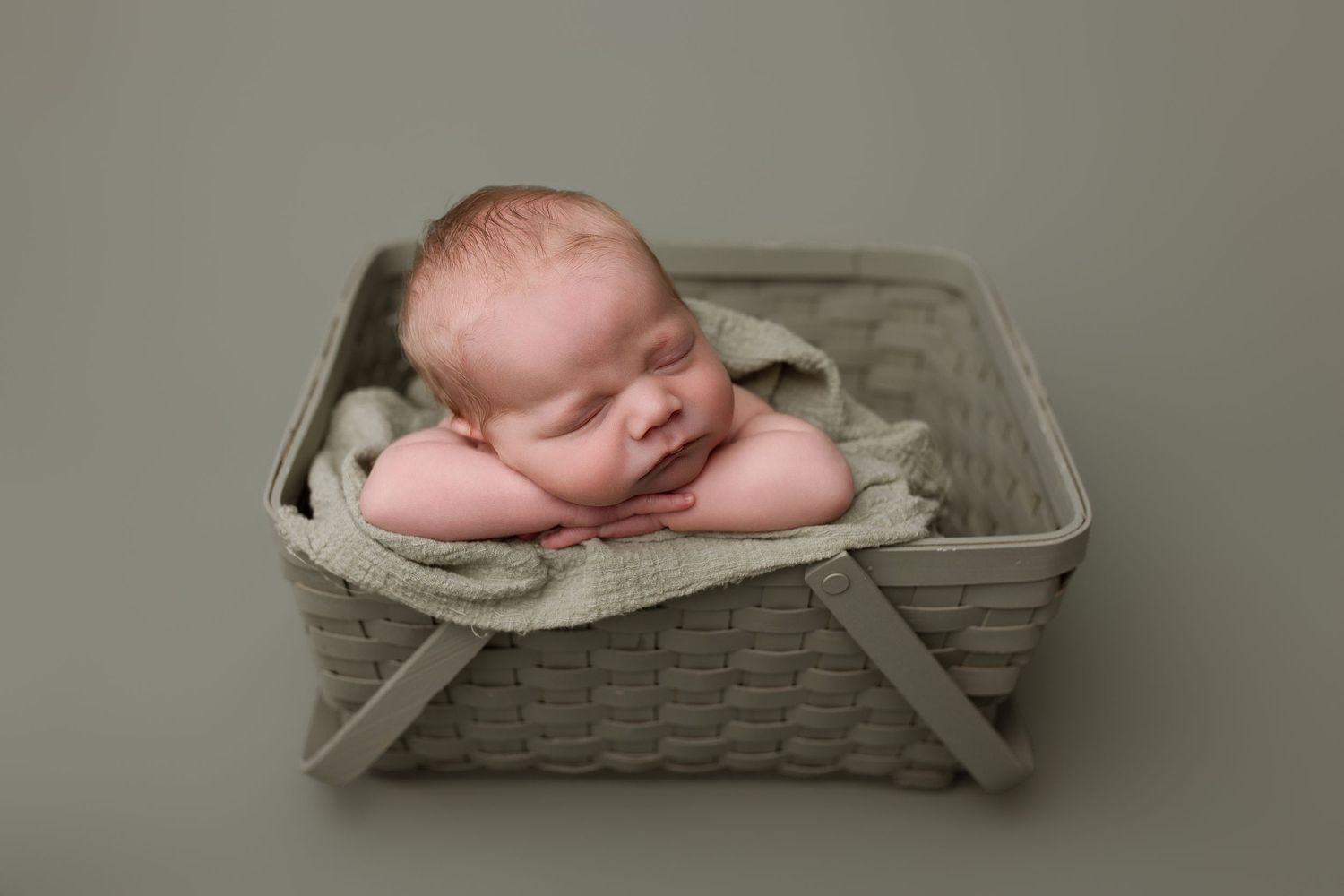 Newborn baby during newborn session with Bree Elle Photography in Port Neches, TX studio. Lumberton, Silsbee, Beaumont, Nederland, Southeast