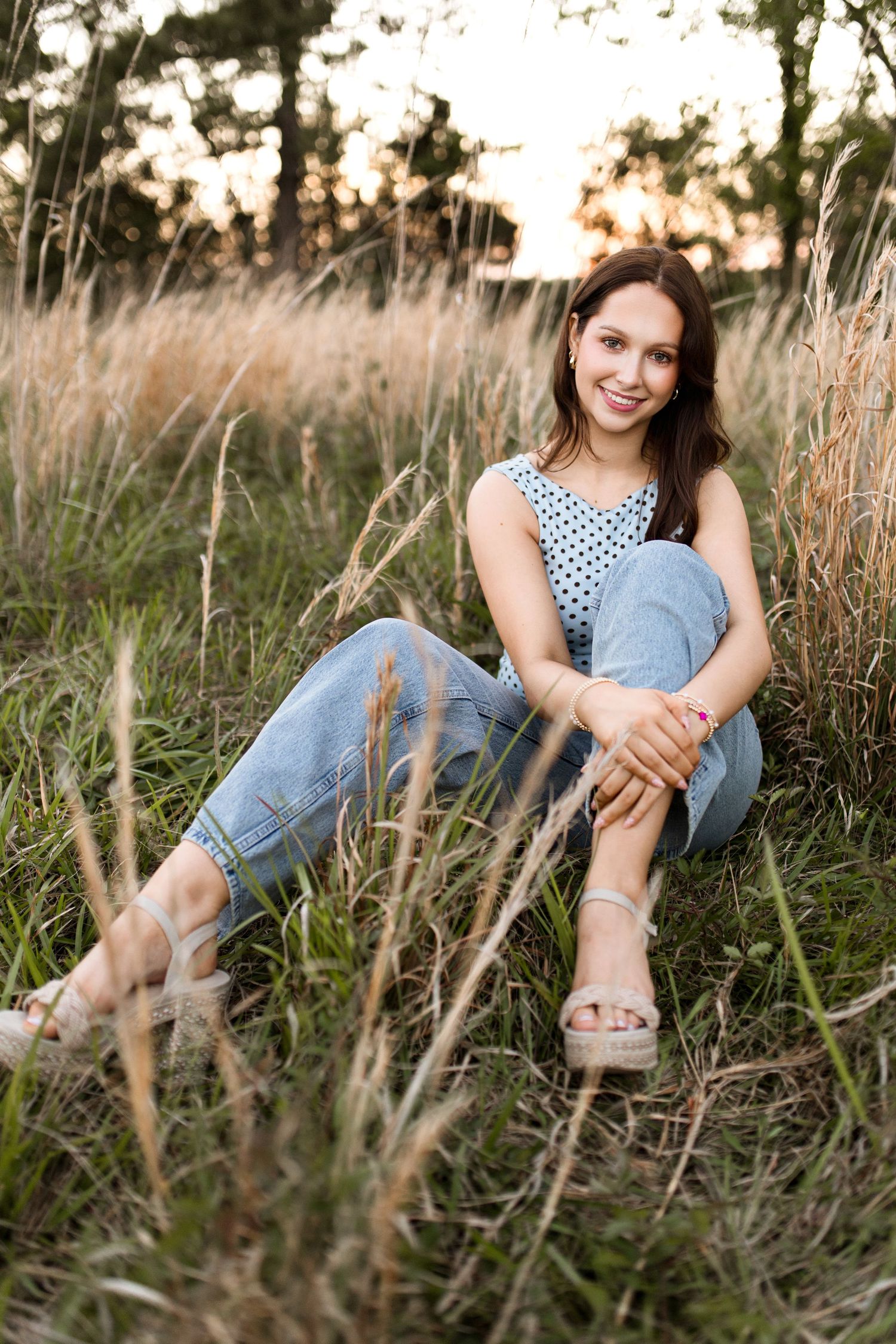 Bree Elle Photography Seniors by Alicia Stephenson. Session with girl in a Beaumont, TX field during senior year photo session.