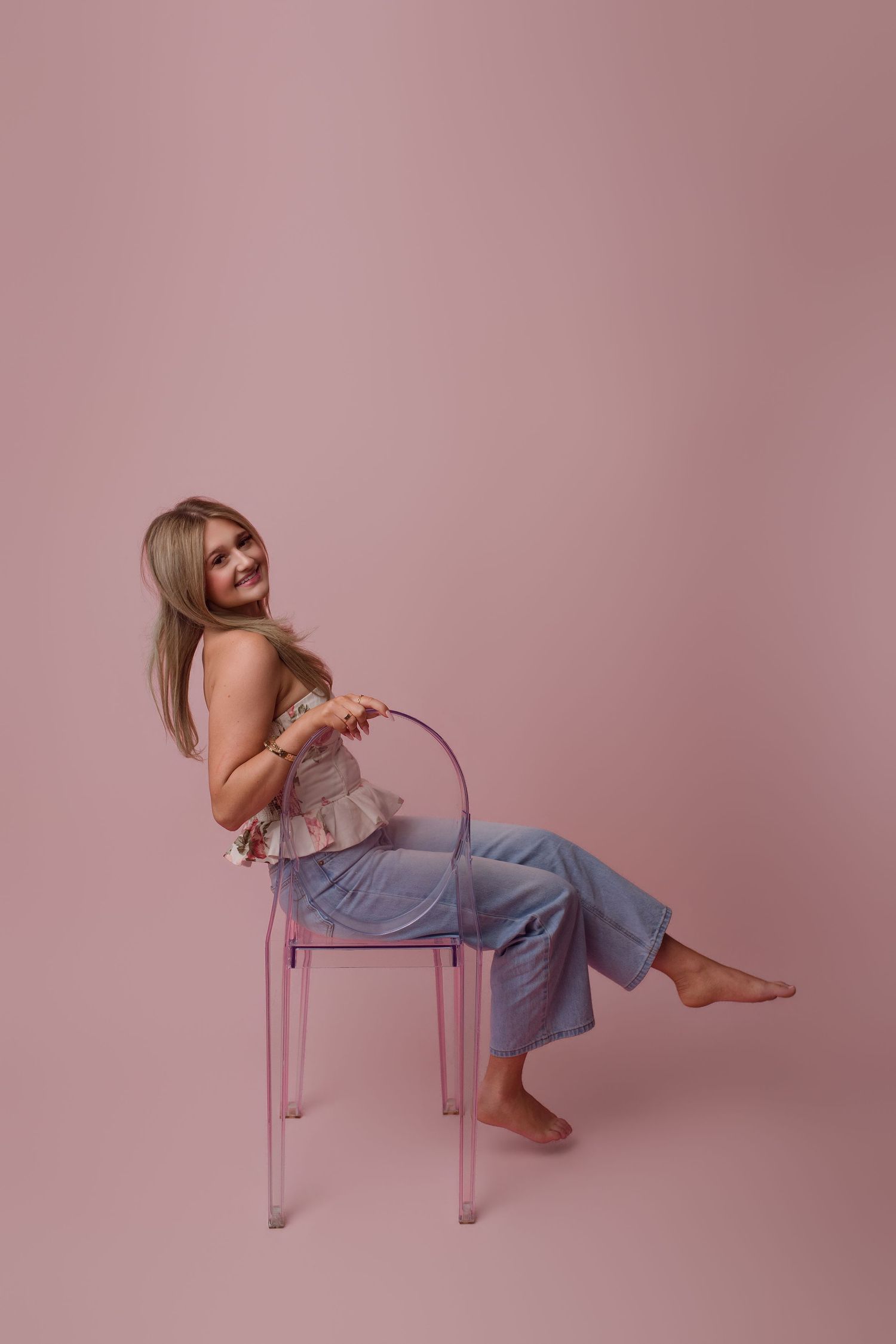 Senior during portrait session with Bree Elle Photography in Port Neches, TX studio.