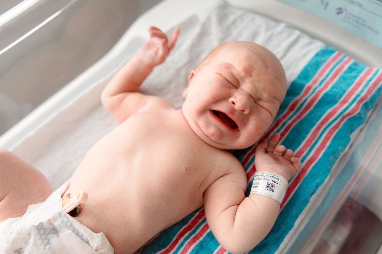 Newborn baby at St. Elizabeth hospital in Beaumont, TX with Bree Elle Photography.