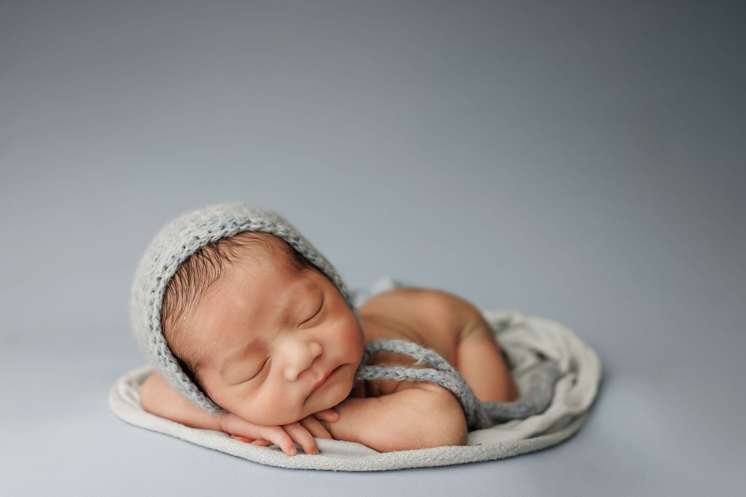 Newborn baby during studio session in Port Neches, TX with Bree Elle Photography.