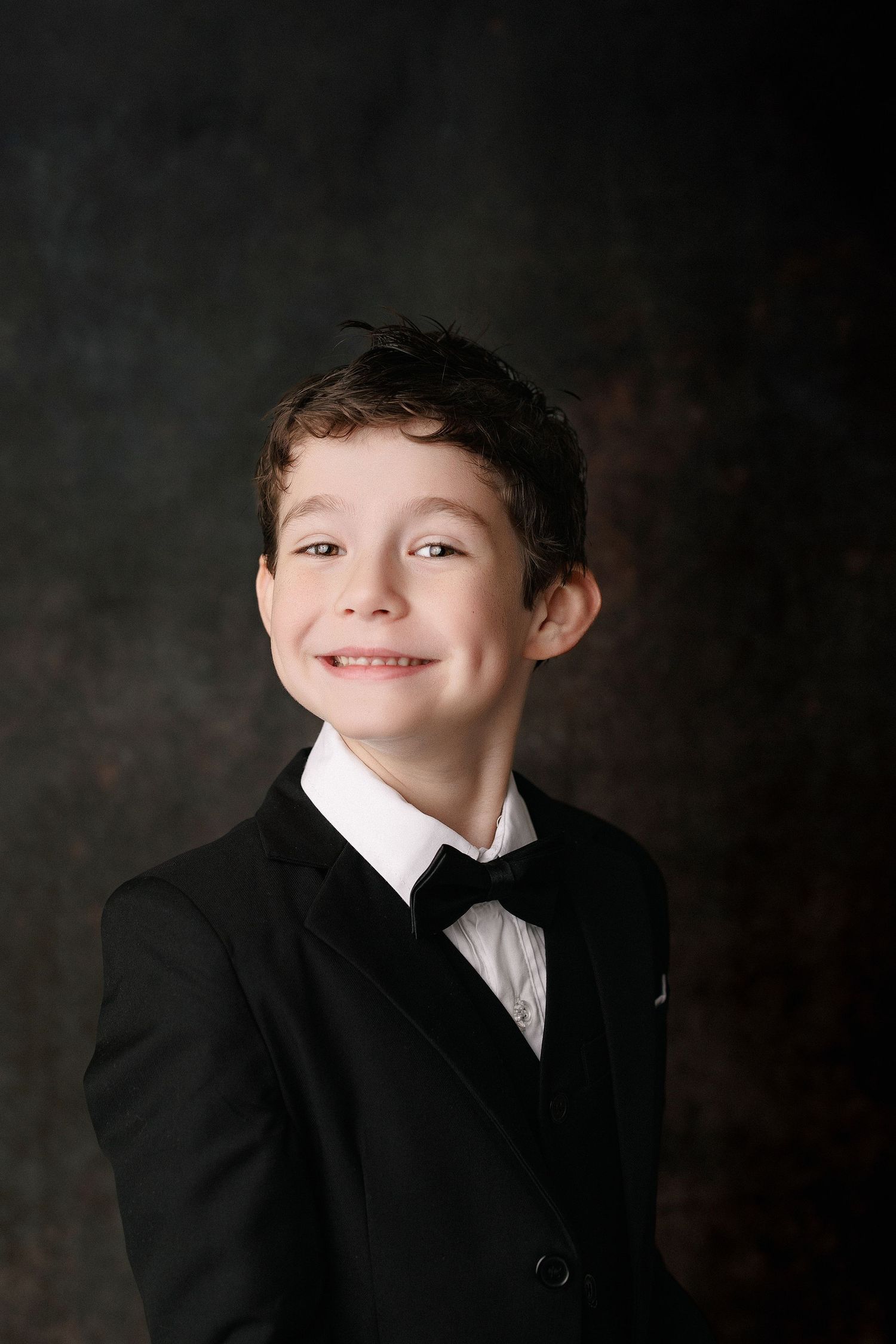 Kinder graduation portrait session with cap and gown in Port Neches, TX with Bree Elle Photography.