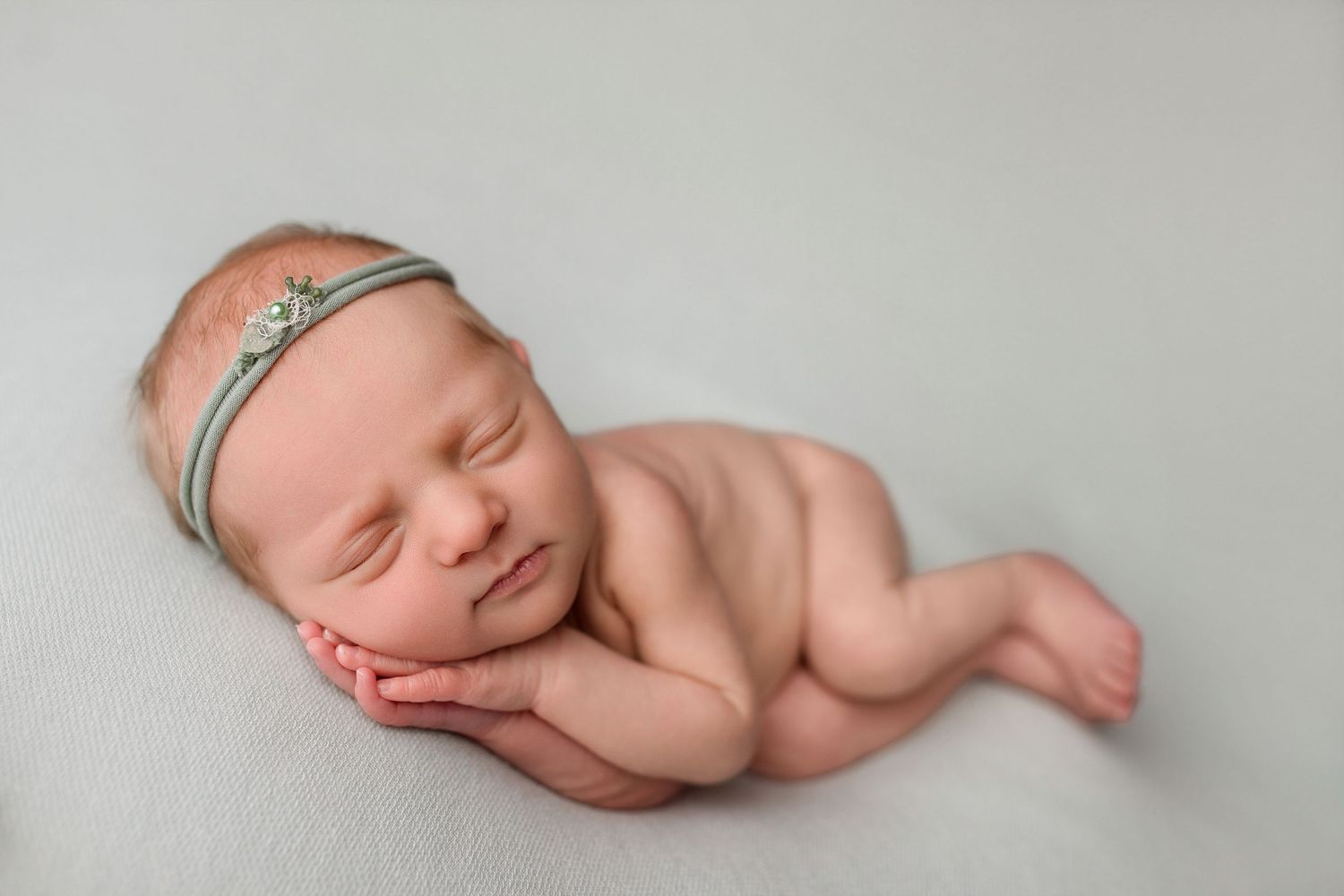 Newborn baby during full newborn session at Bree Elle Photography that includes baby only plus siblings. Beaumont photographer, Port Neches