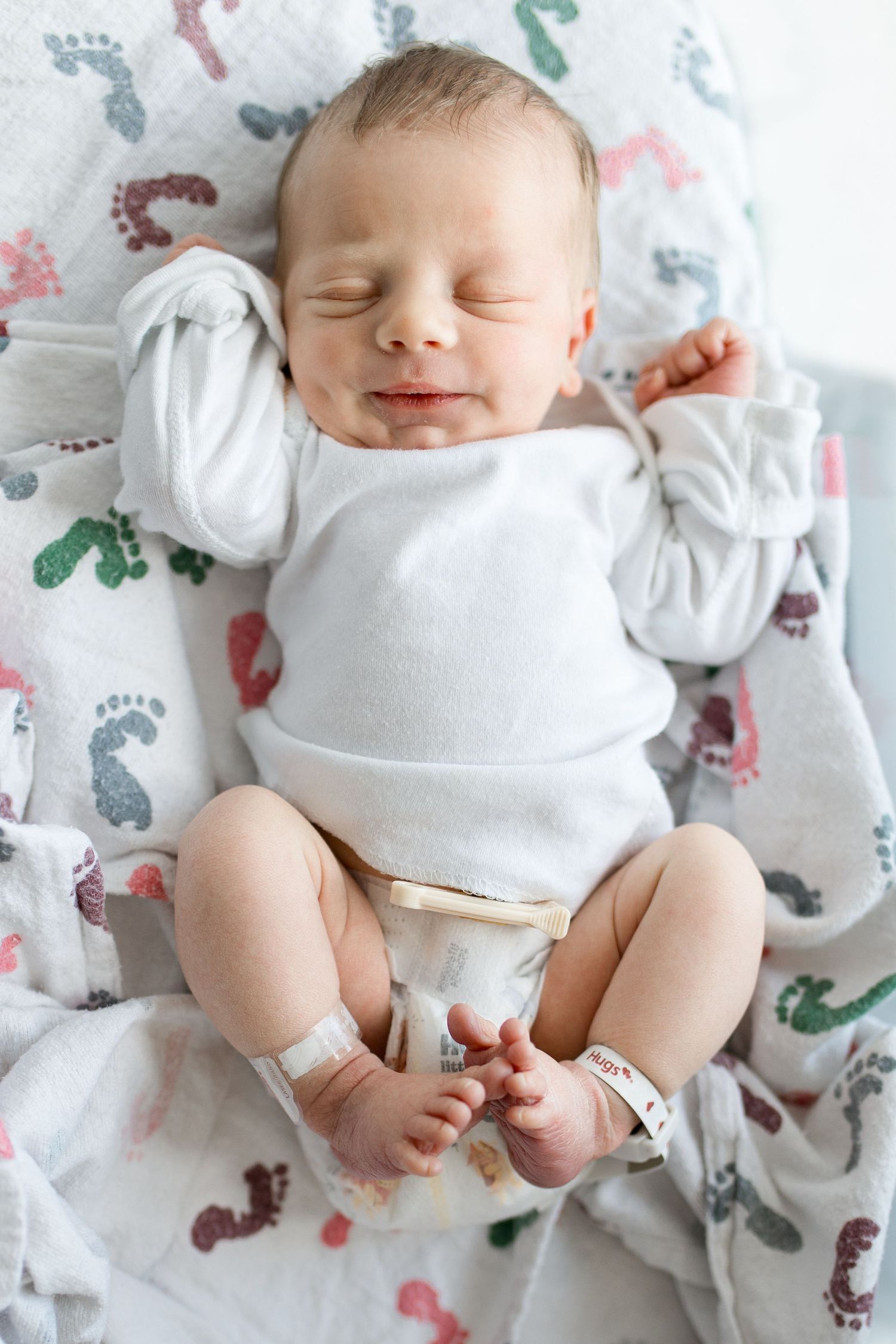 Newborn baby during Fresh 48 session at St. Elizabeth hospital in Beaumont, TX with Bree Elle Photography.