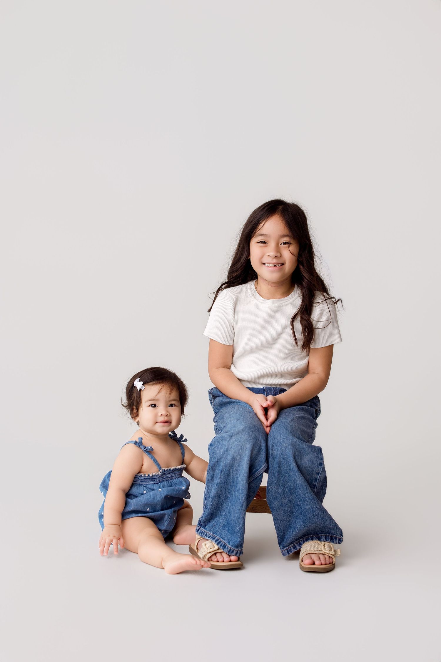 One year old family portion with sibling during one year session Bree Elle Photography in Port Neches, TX.